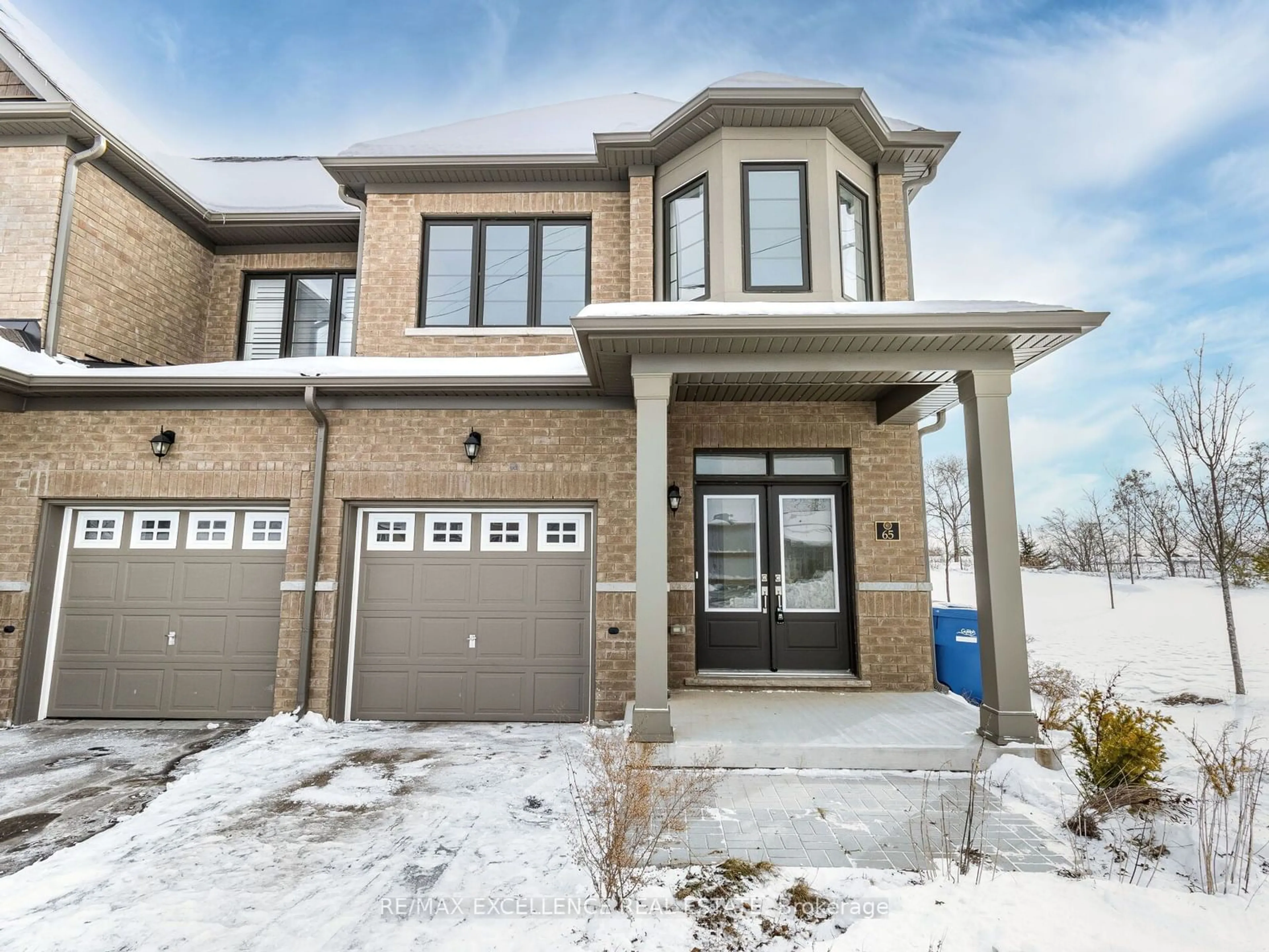 Home with brick exterior material, street for 166 Deerpath Dr #65, Guelph Ontario N1K 0E2