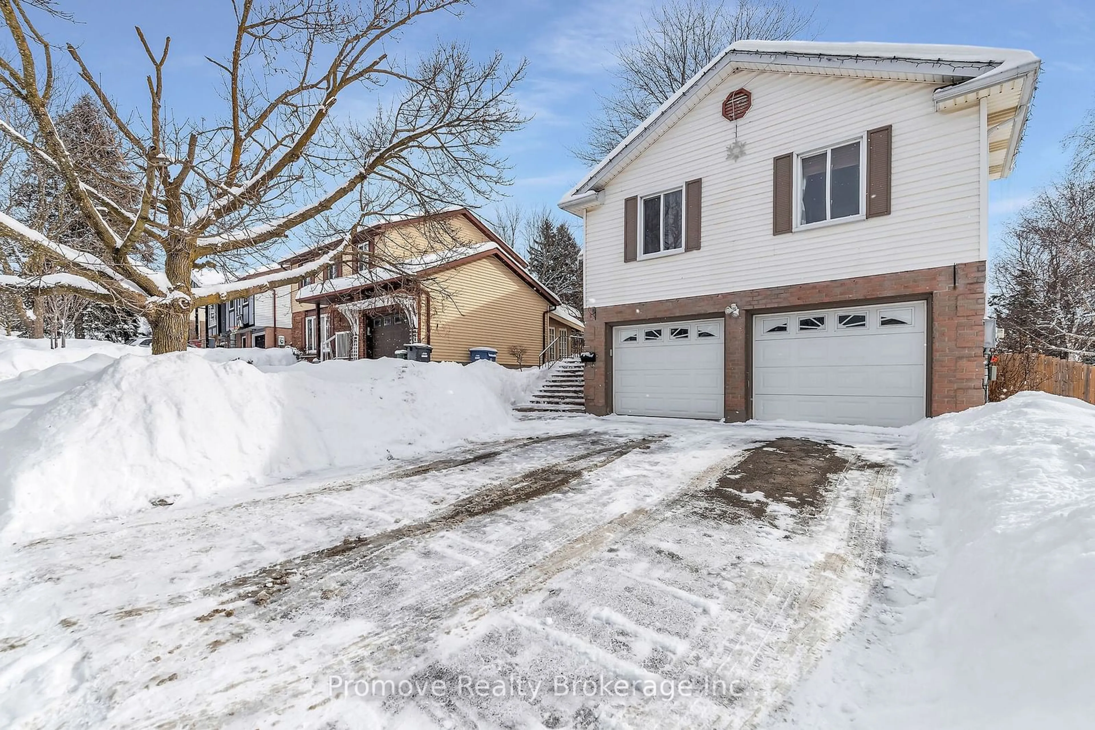 A pic from outside/outdoor area/front of a property/back of a property/a pic from drone, street for 588 Willow Rd, Guelph Ontario N1H 7M5