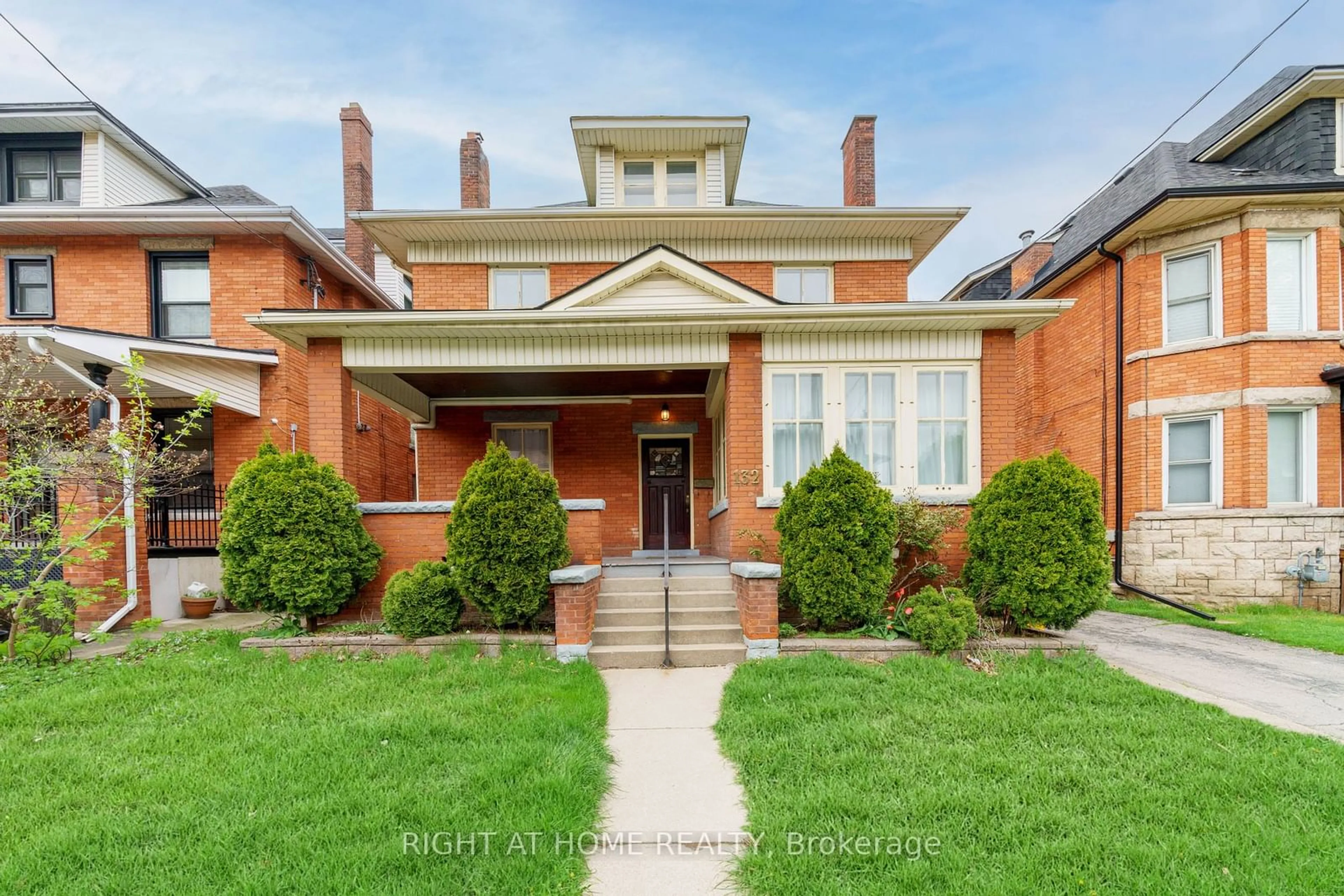 Home with brick exterior material, street for 132 Holton Ave, Hamilton Ontario L8M 2L5