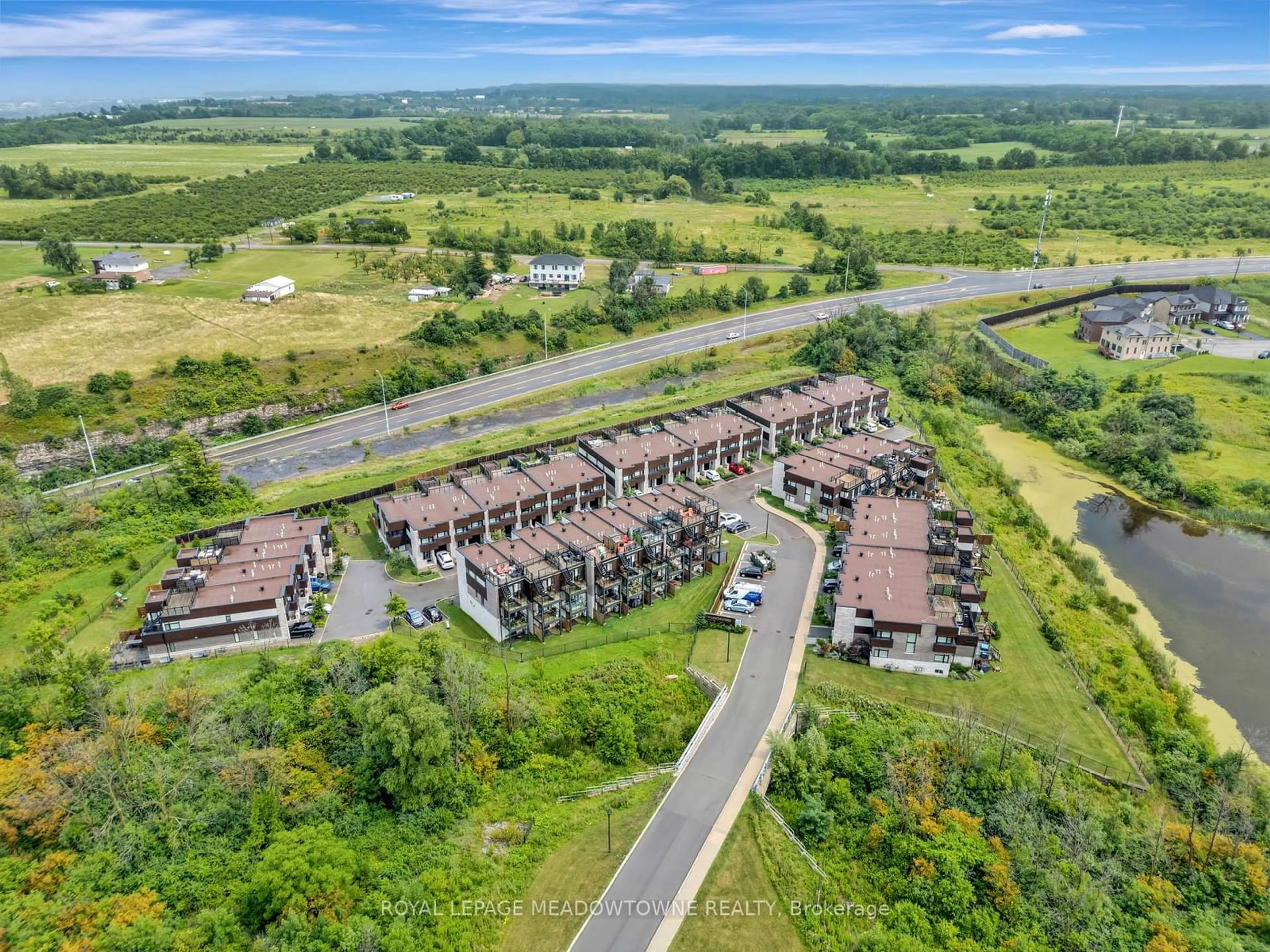 A pic from outside/outdoor area/front of a property/back of a property/a pic from drone, unknown for 35 Midhurst Hts #20, Hamilton Ontario L8K 0K9