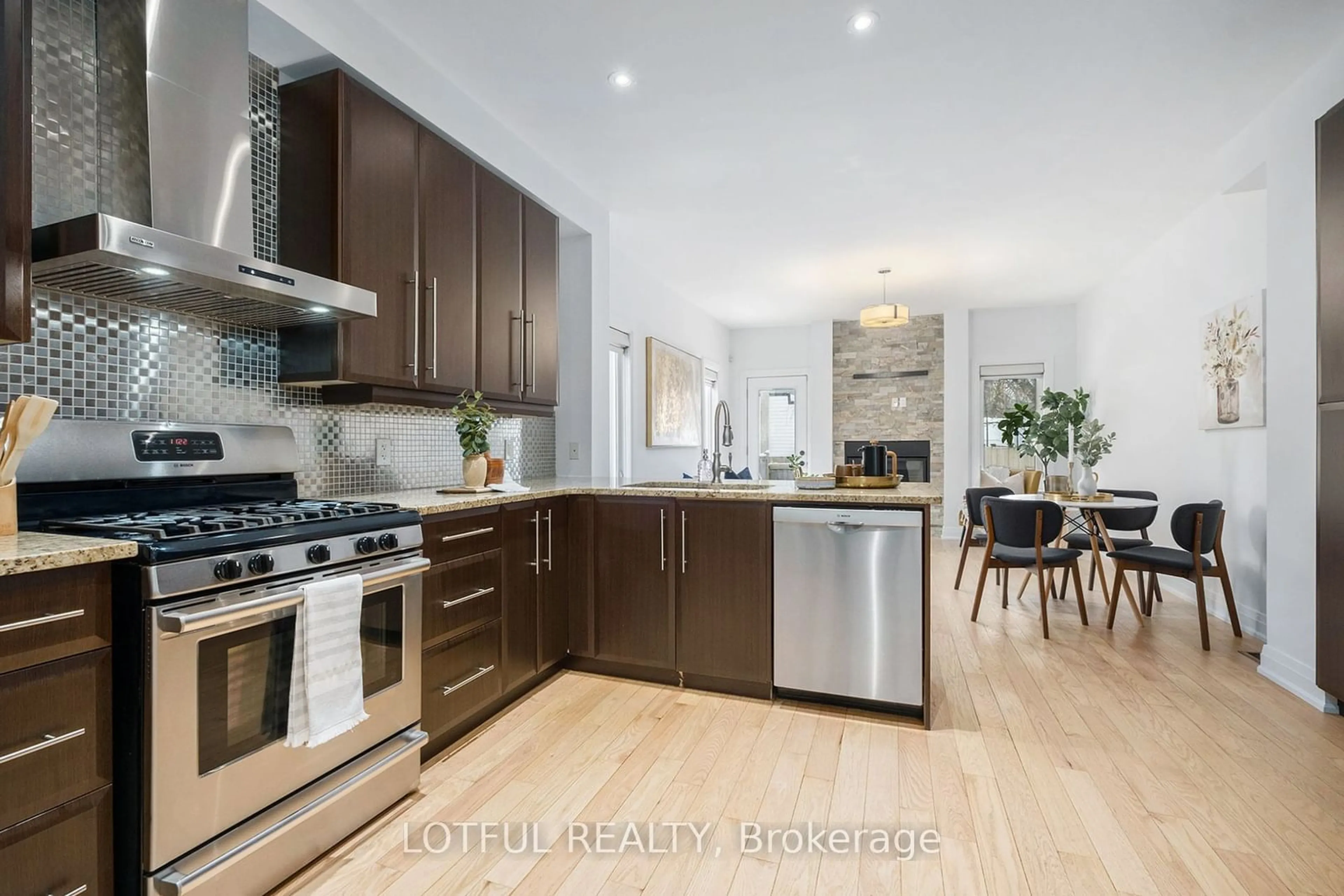 Open concept kitchen, wood/laminate floor for 58 YOUNG St #A, Dows Lake - Civic Hospital and Area Ontario K1S 3H9