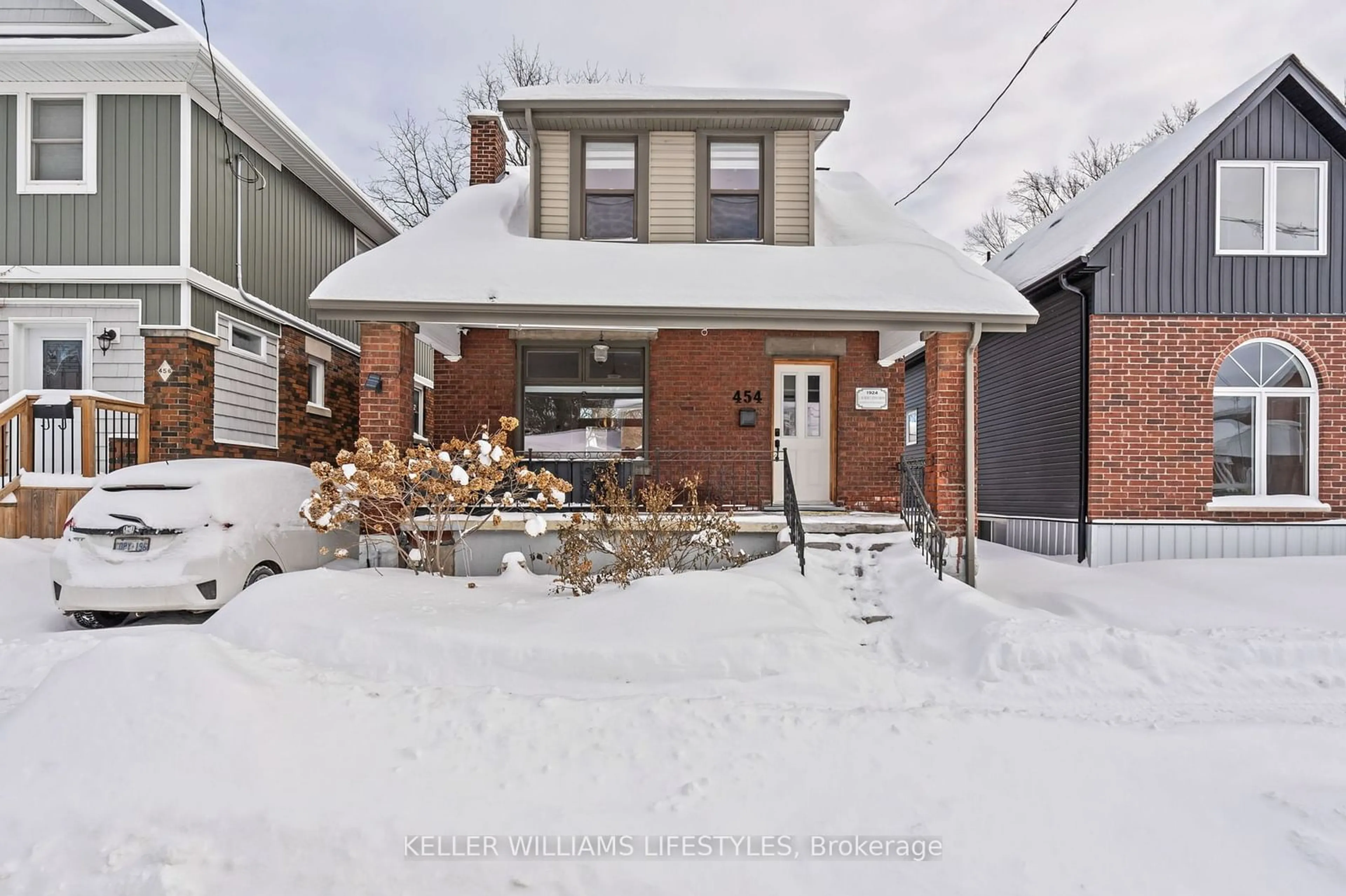 Home with brick exterior material, street for 454 Woodman Ave, London Ontario N5W 3Z9