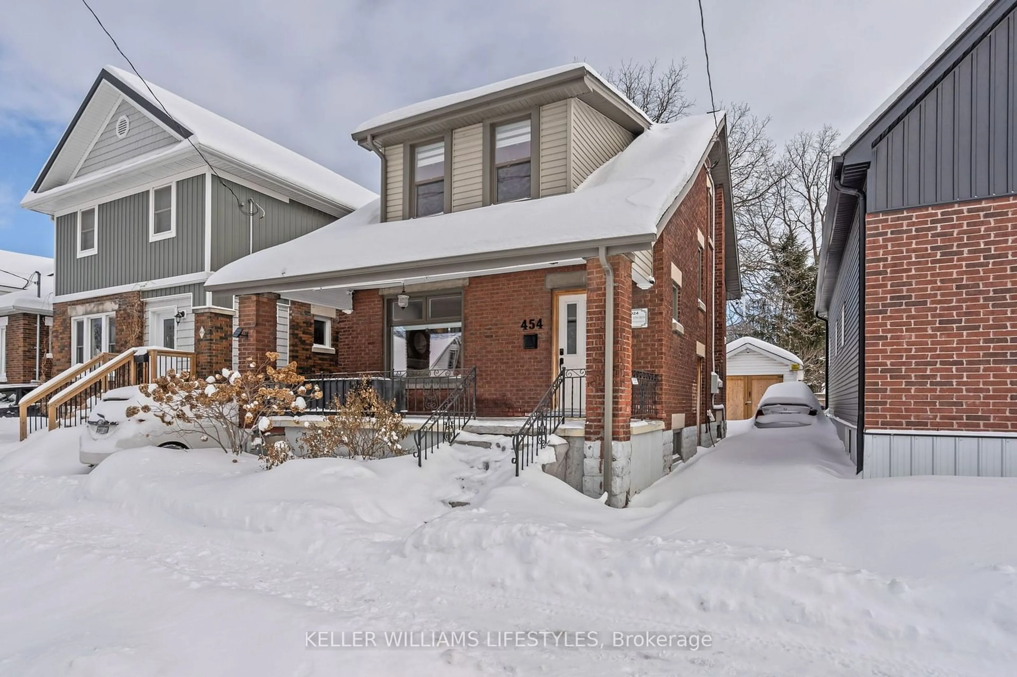 Home with brick exterior material, street for 454 Woodman Ave, London Ontario N5W 3Z9