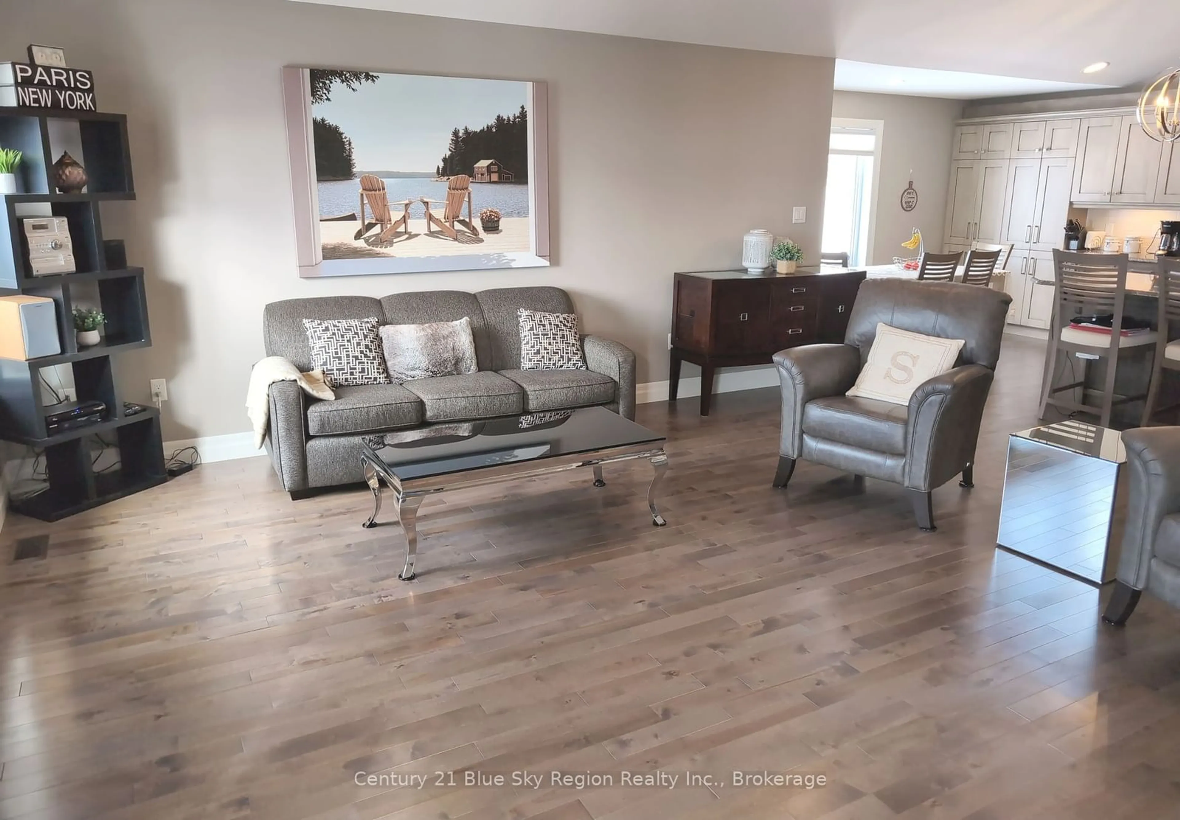 Living room with furniture, wood/laminate floor for 64 Bain Dr, North Bay Ontario P1C 0B6