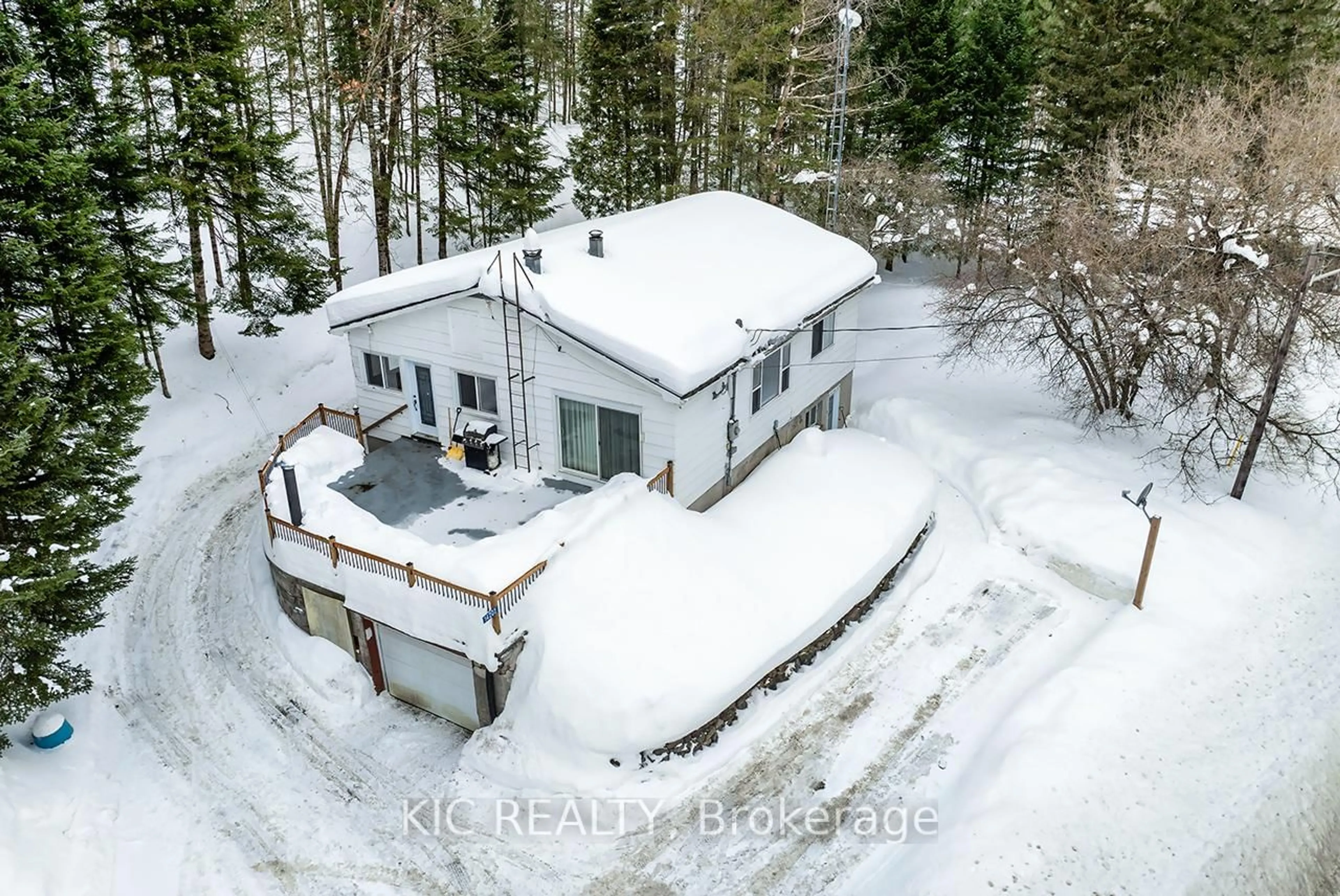 A pic from outside/outdoor area/front of a property/back of a property/a pic from drone, building for 14202 Highway 118 High, Dysart et al Ontario K0M 1S0