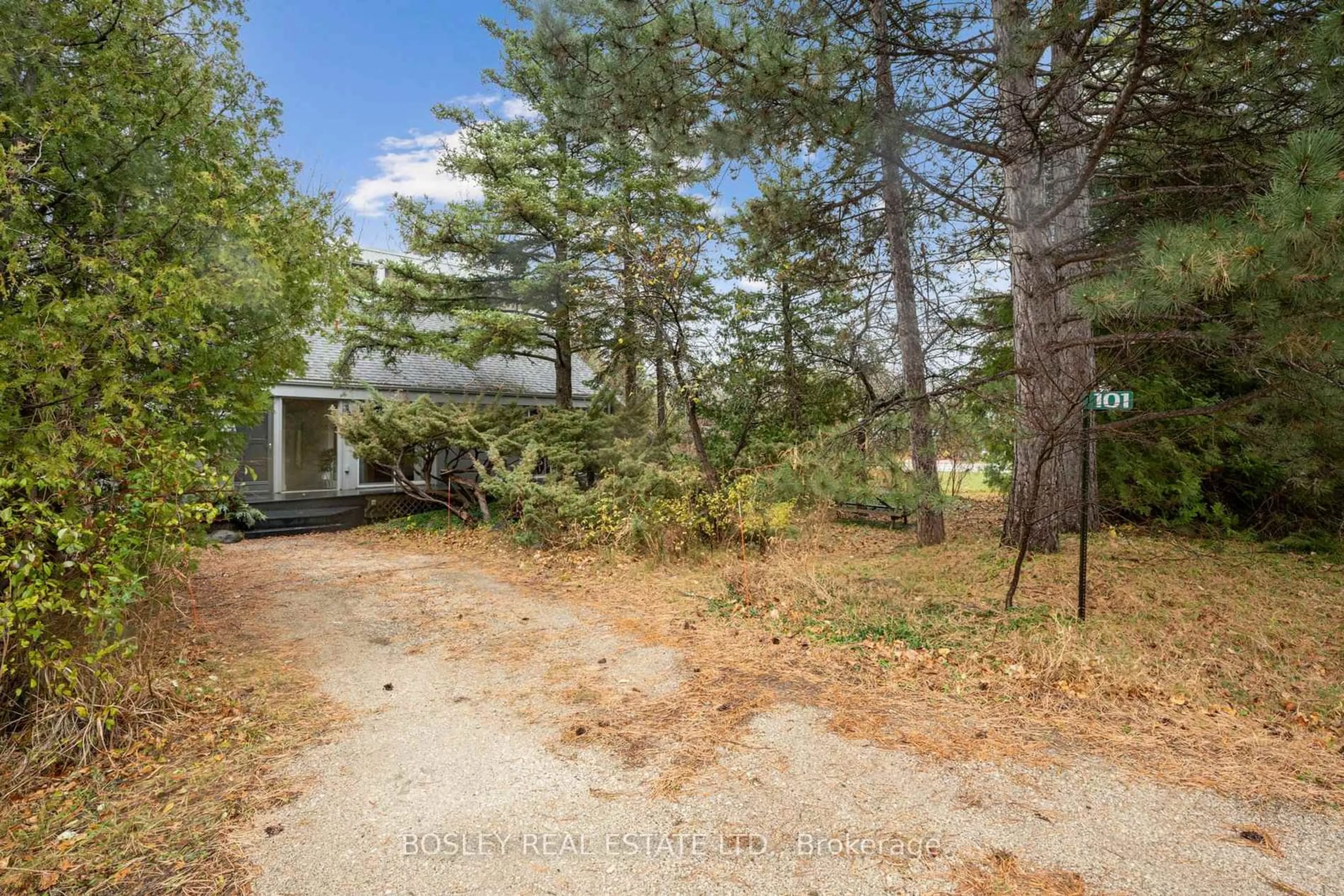 A pic from outside/outdoor area/front of a property/back of a property/a pic from drone, forest/trees view for 101 St Moritz Cres, Blue Mountains Ontario L9Y 0S6