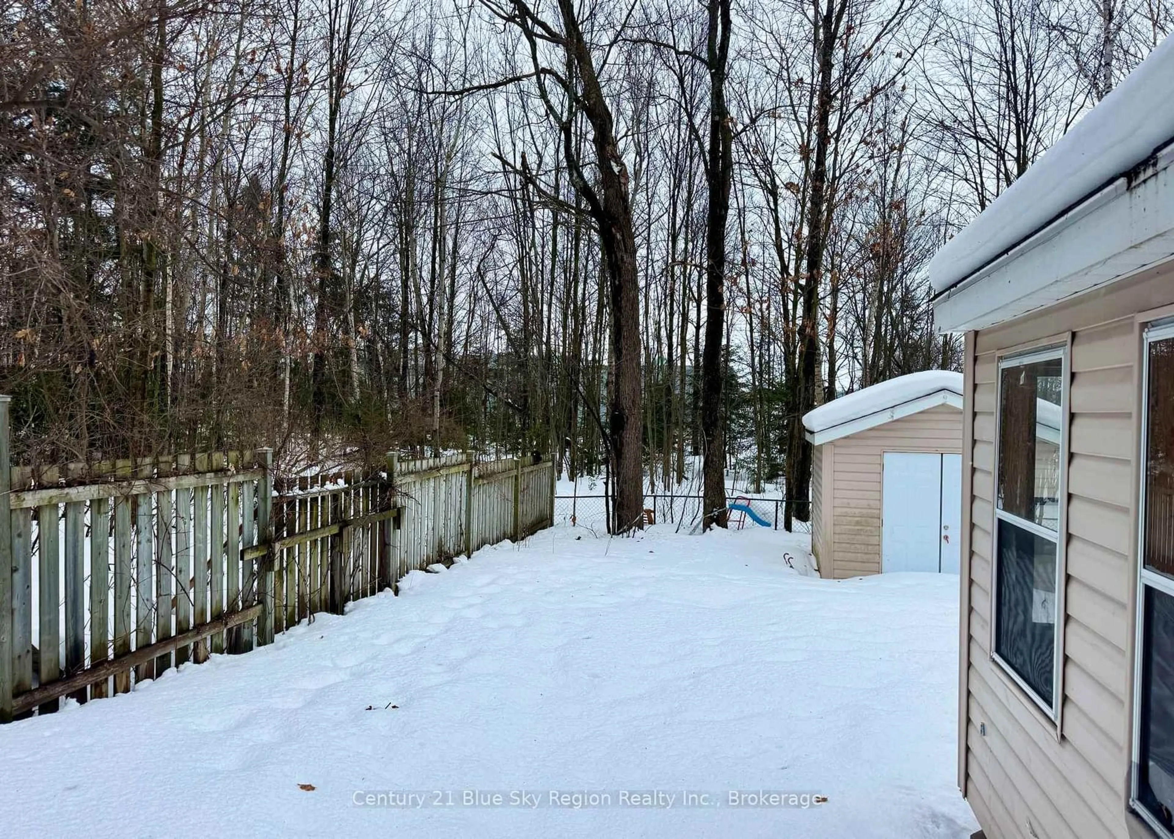 A pic from outside/outdoor area/front of a property/back of a property/a pic from drone, forest/trees view for 202 Cartier St, North Bay Ontario P1B 5J7