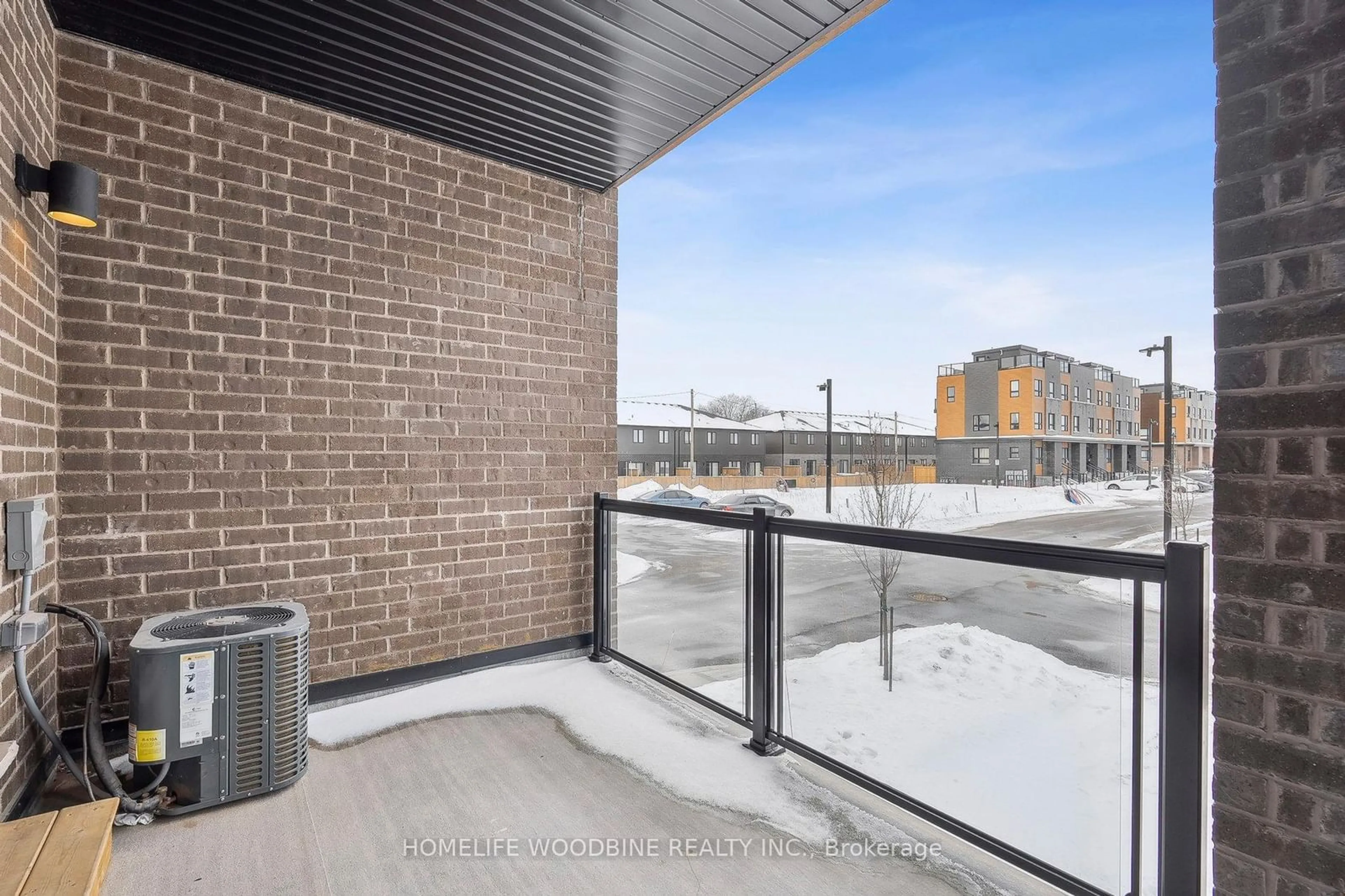 Balcony in the apartment, city buildings view from balcony for 6705 Cropp St #65, Niagara Falls Ontario L2E 5J8