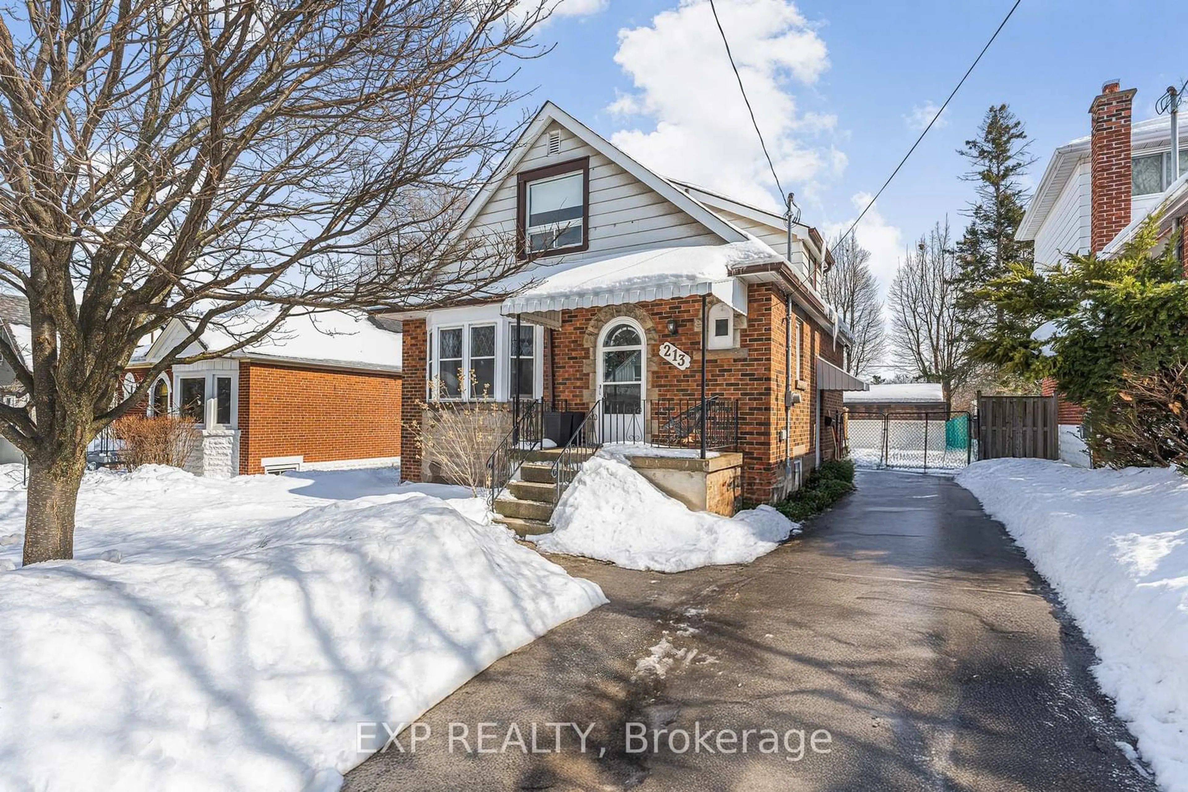 Home with brick exterior material, street for 213 East 19th St, Hamilton Ontario L9A 4S4