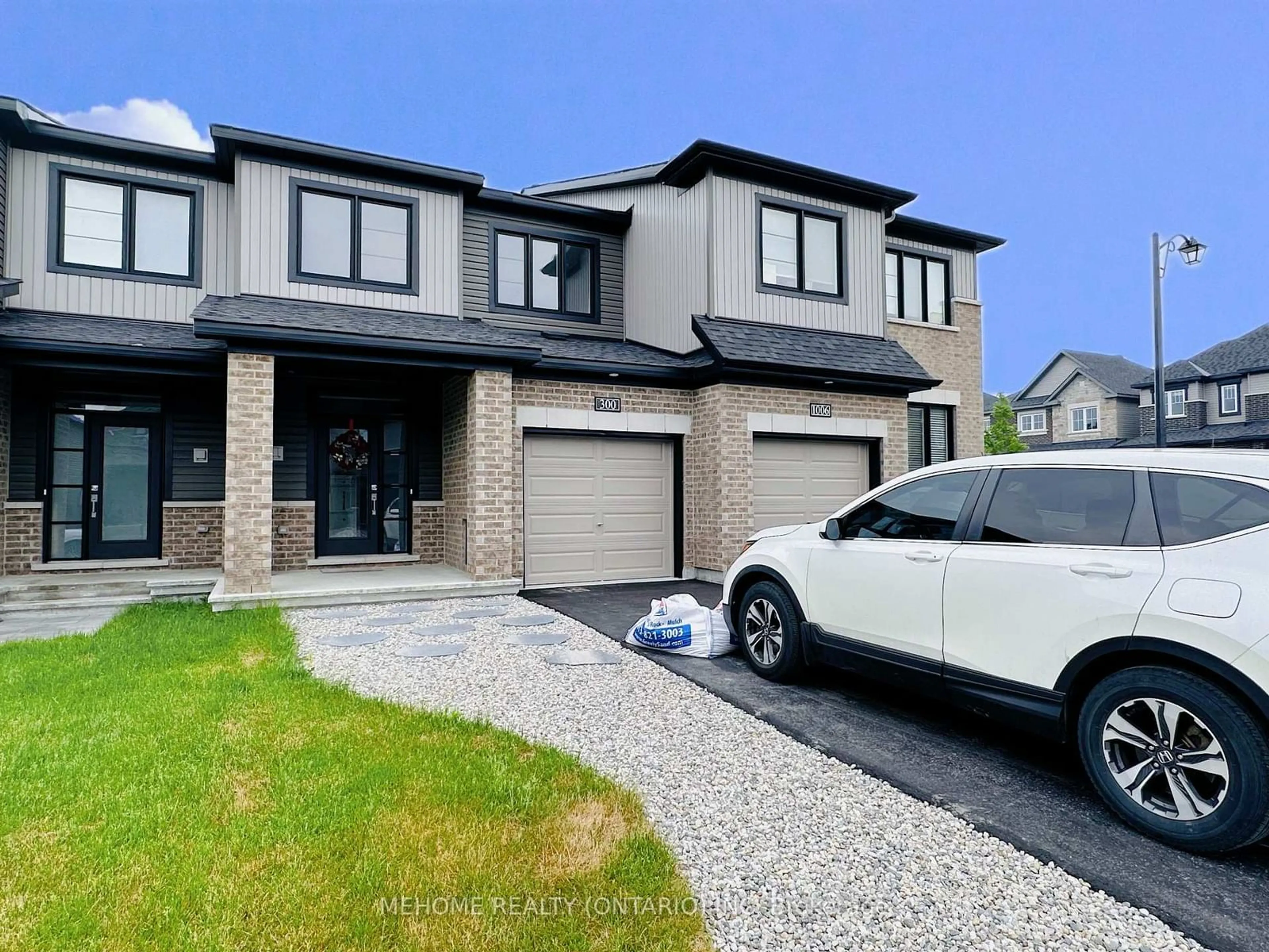 Home with brick exterior material, street for 300 Basalt Lane, Kanata Ontario K2T 0K7