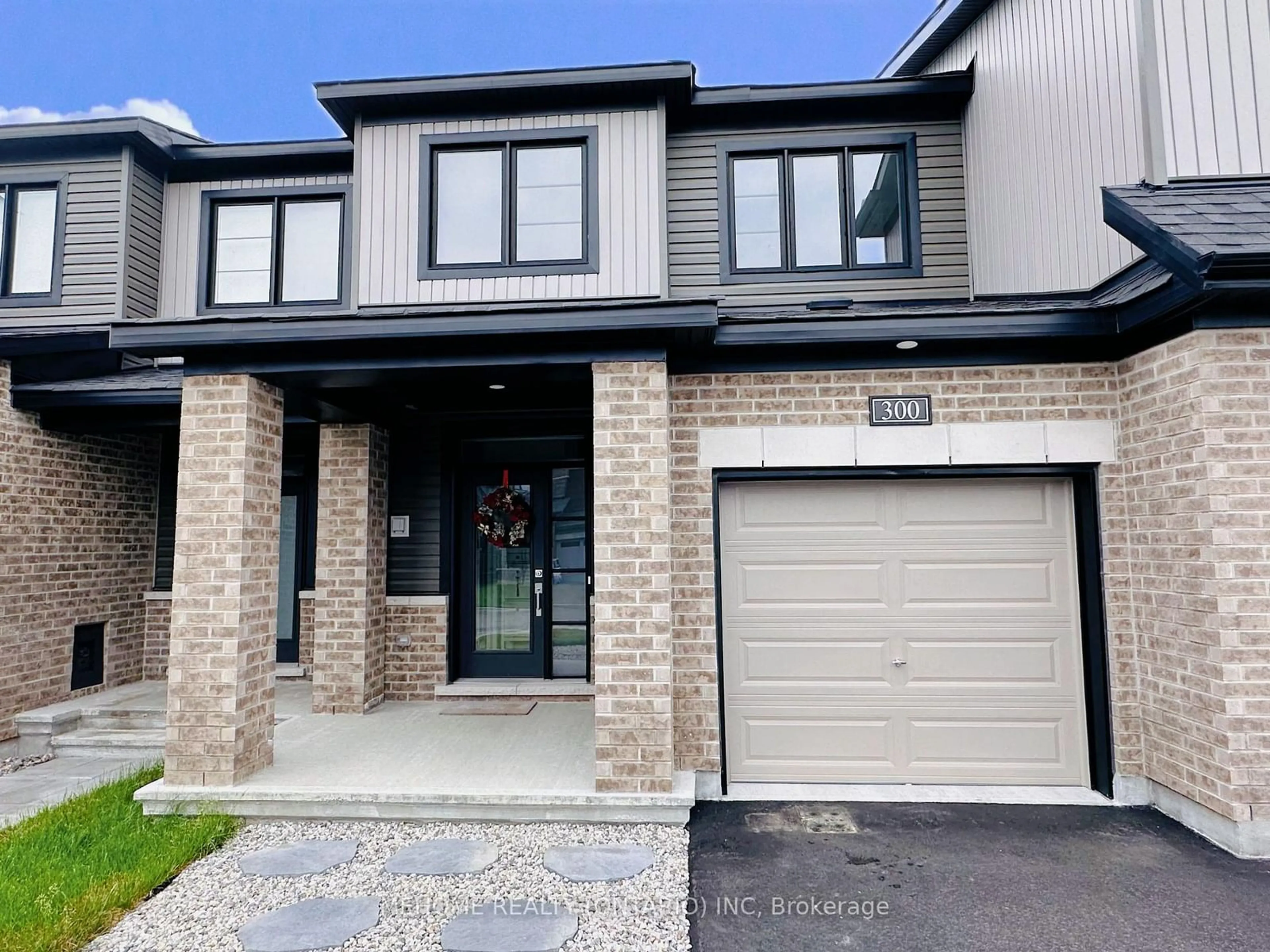 Home with brick exterior material, street for 300 Basalt Lane, Kanata Ontario K2T 0K7