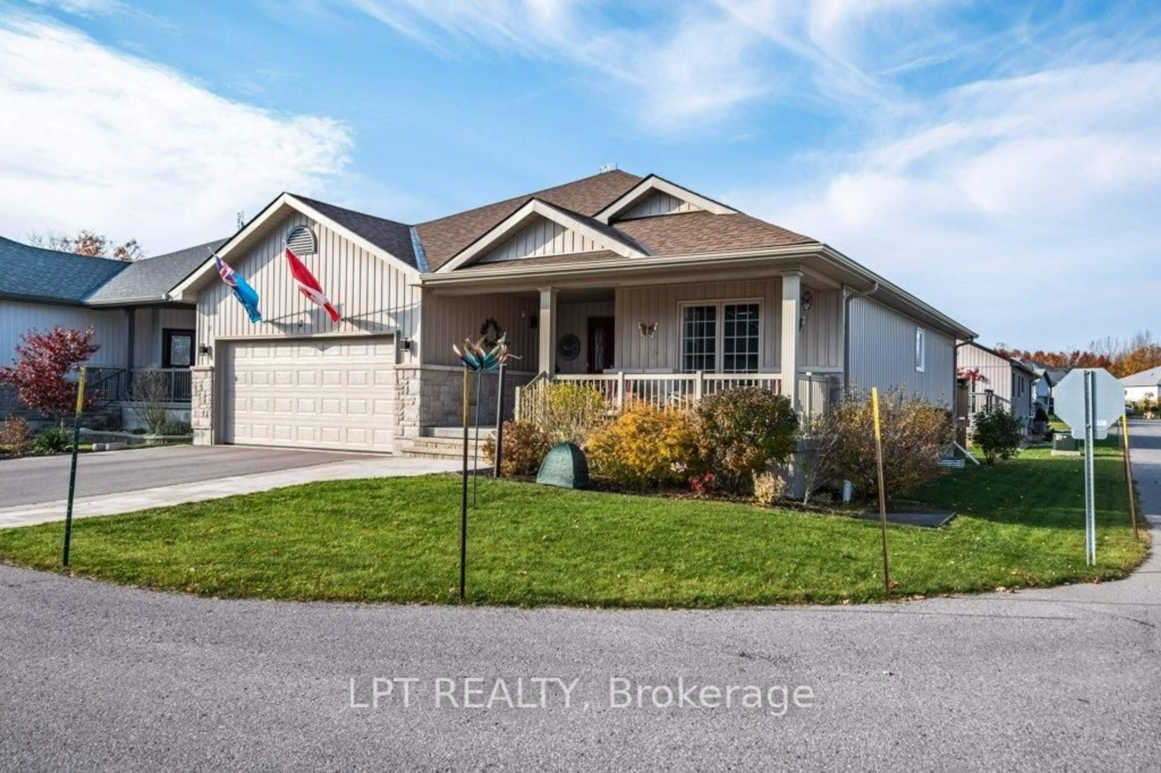 Home with vinyl exterior material, street for 2 Merrill Dr, Prince Edward County Ontario K0K 3L0