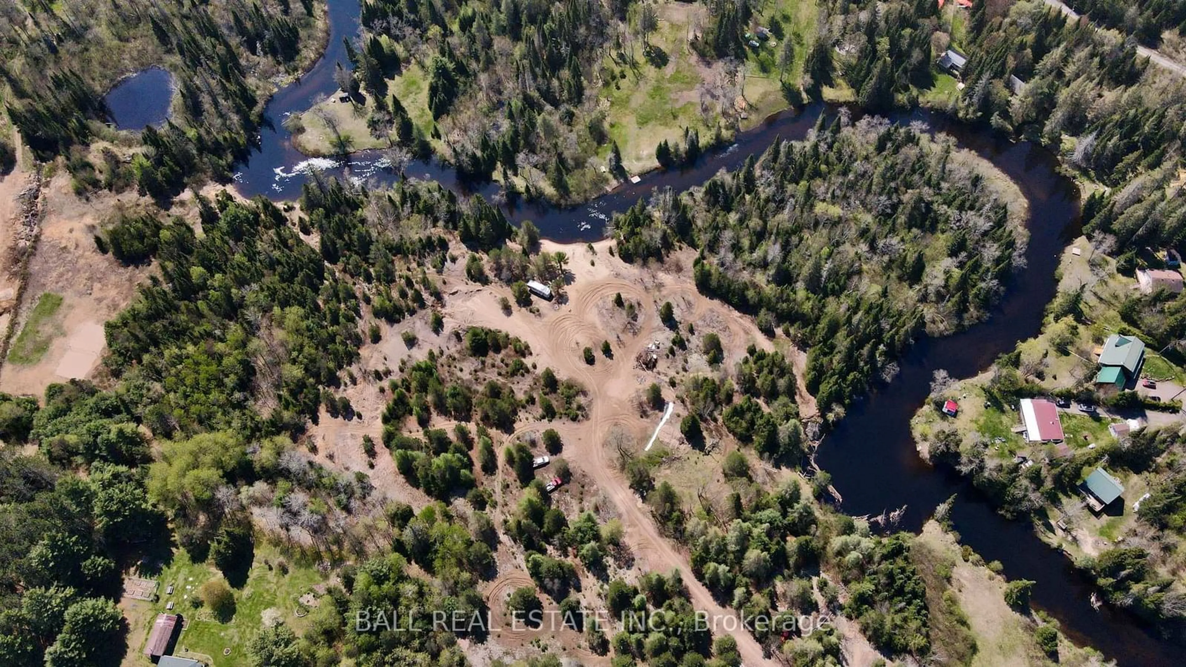 A pic from outside/outdoor area/front of a property/back of a property/a pic from drone, unknown for 10092 County Road 503, Highlands East Ontario K0M 1R0