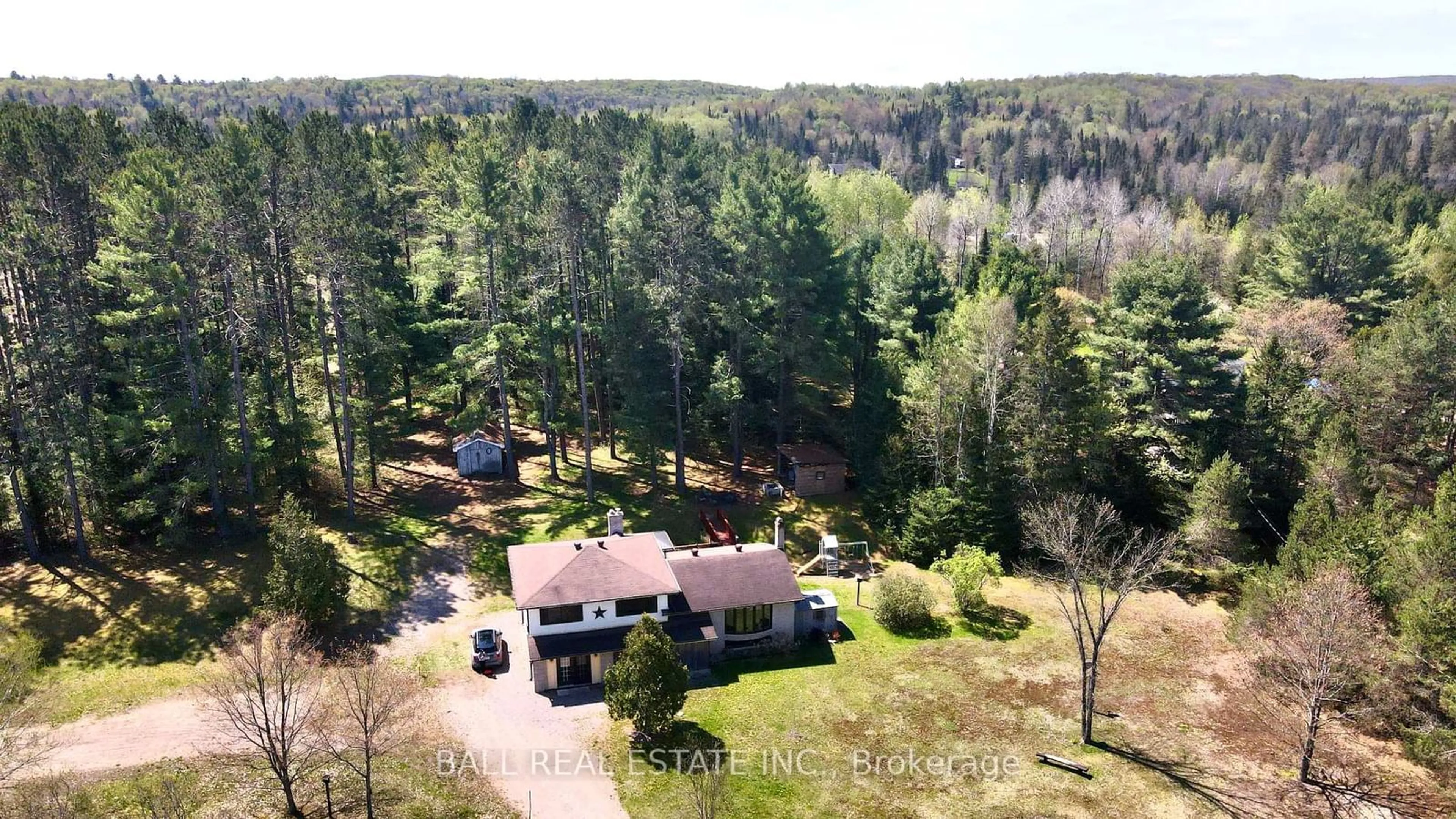 A pic from outside/outdoor area/front of a property/back of a property/a pic from drone, forest/trees view for 10092 County Road 503, Highlands East Ontario K0M 1R0