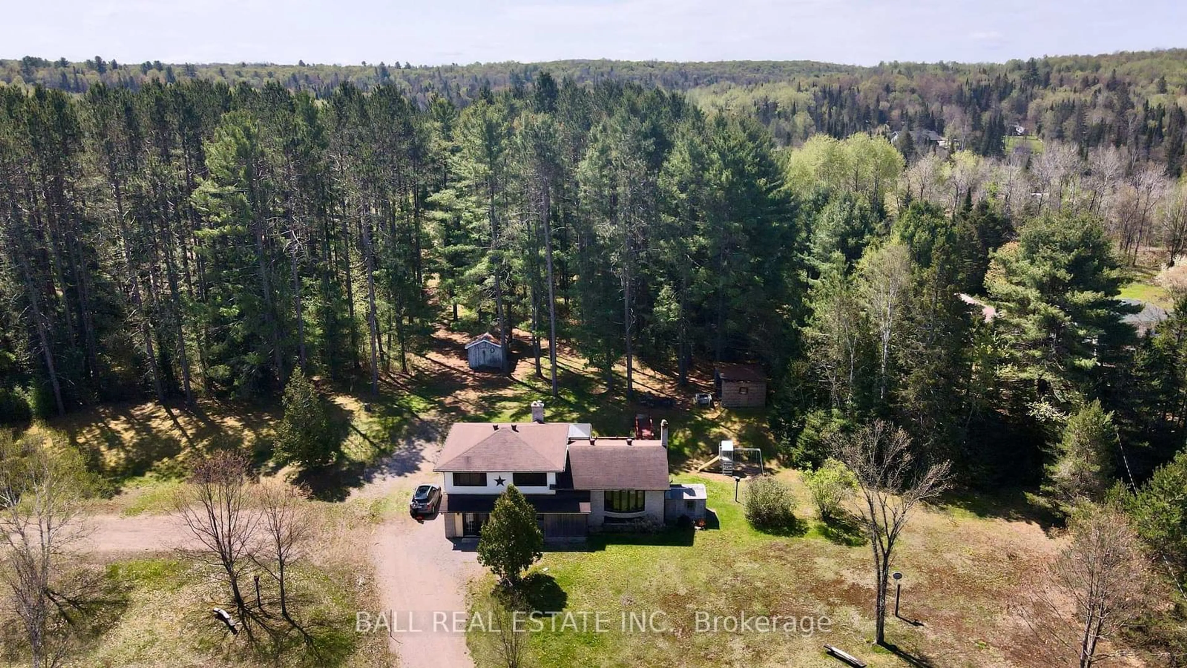 A pic from outside/outdoor area/front of a property/back of a property/a pic from drone, forest/trees view for 10092 County Road 503, Highlands East Ontario K0M 1R0