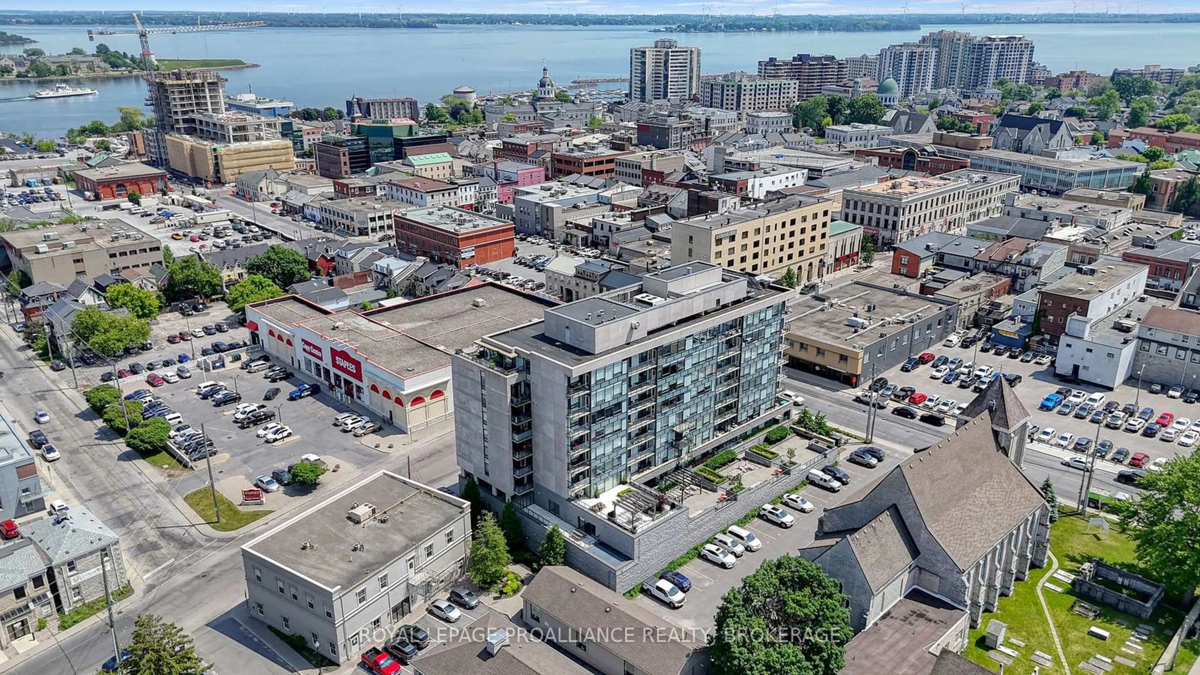 A pic from outside/outdoor area/front of a property/back of a property/a pic from drone, city buildings view from balcony for 121 Queen St #604, Kingston Ontario K7K 0G6