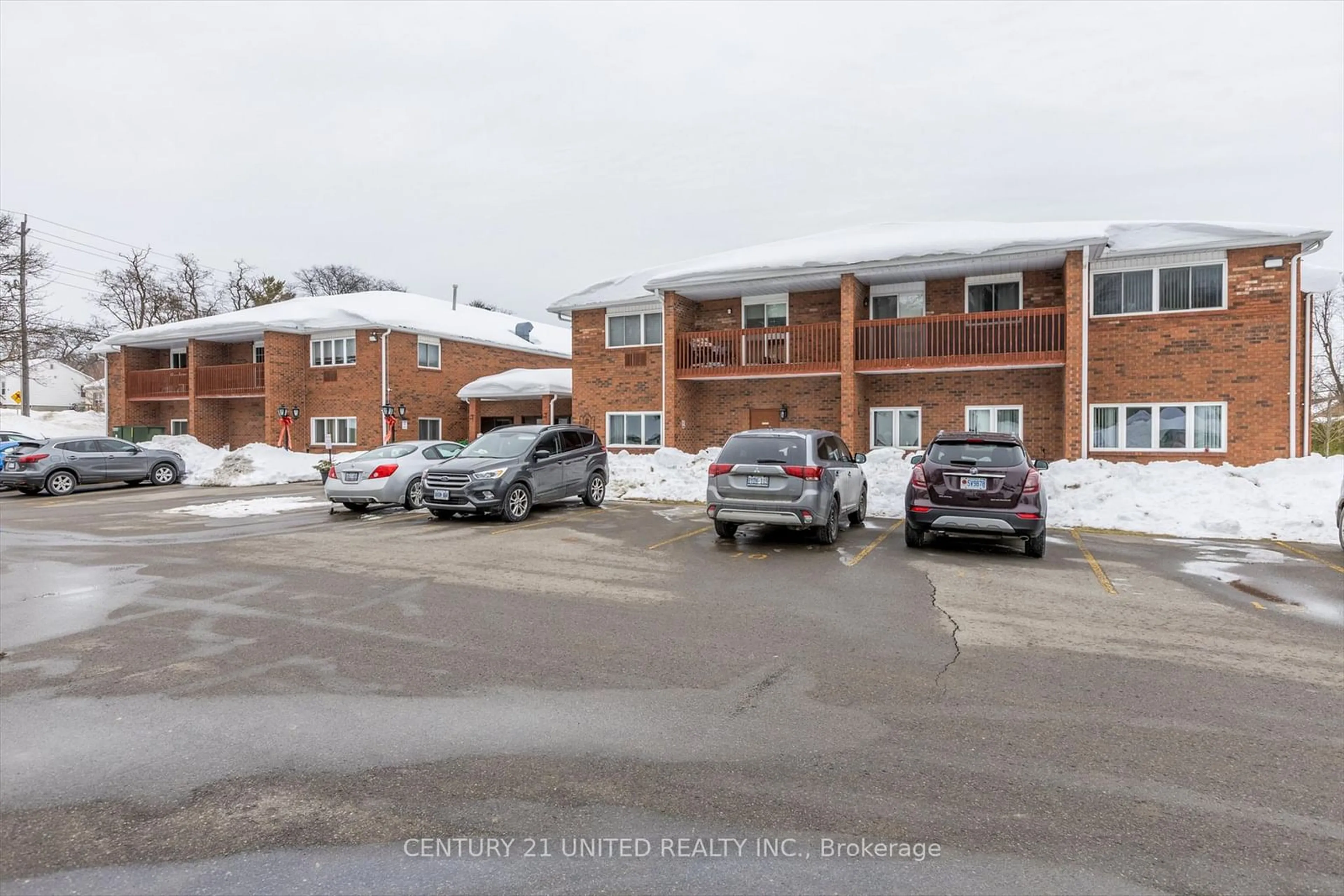 A pic from outside/outdoor area/front of a property/back of a property/a pic from drone, street for 475 Parkhill Rd #210, Peterborough Ontario K9H 7M5