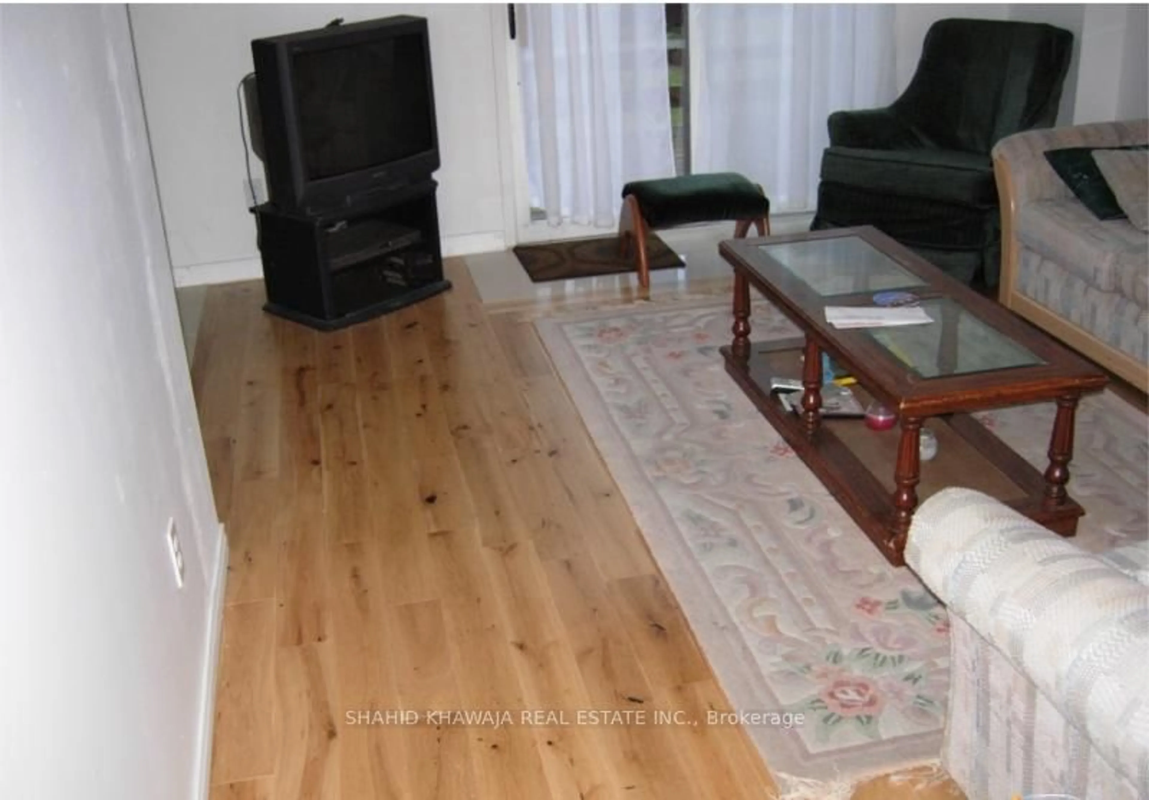 Living room with furniture, wood/laminate floor for 143 JANEFIELD AVE #9, Guelph Ontario N1G 2L4