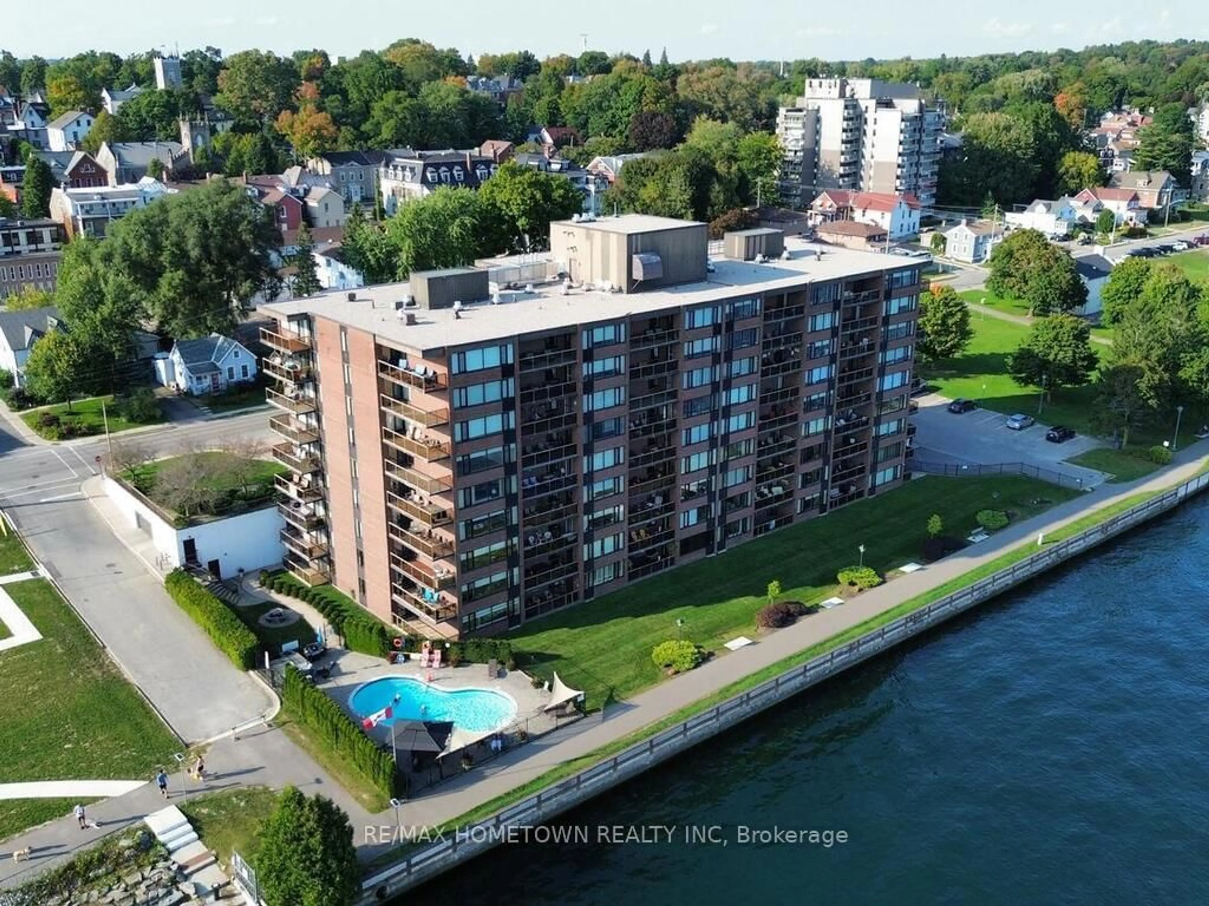 A pic from outside/outdoor area/front of a property/back of a property/a pic from drone, water/lake/river/ocean view for 55 WATER St #103, Brockville Ontario K6V 1A3