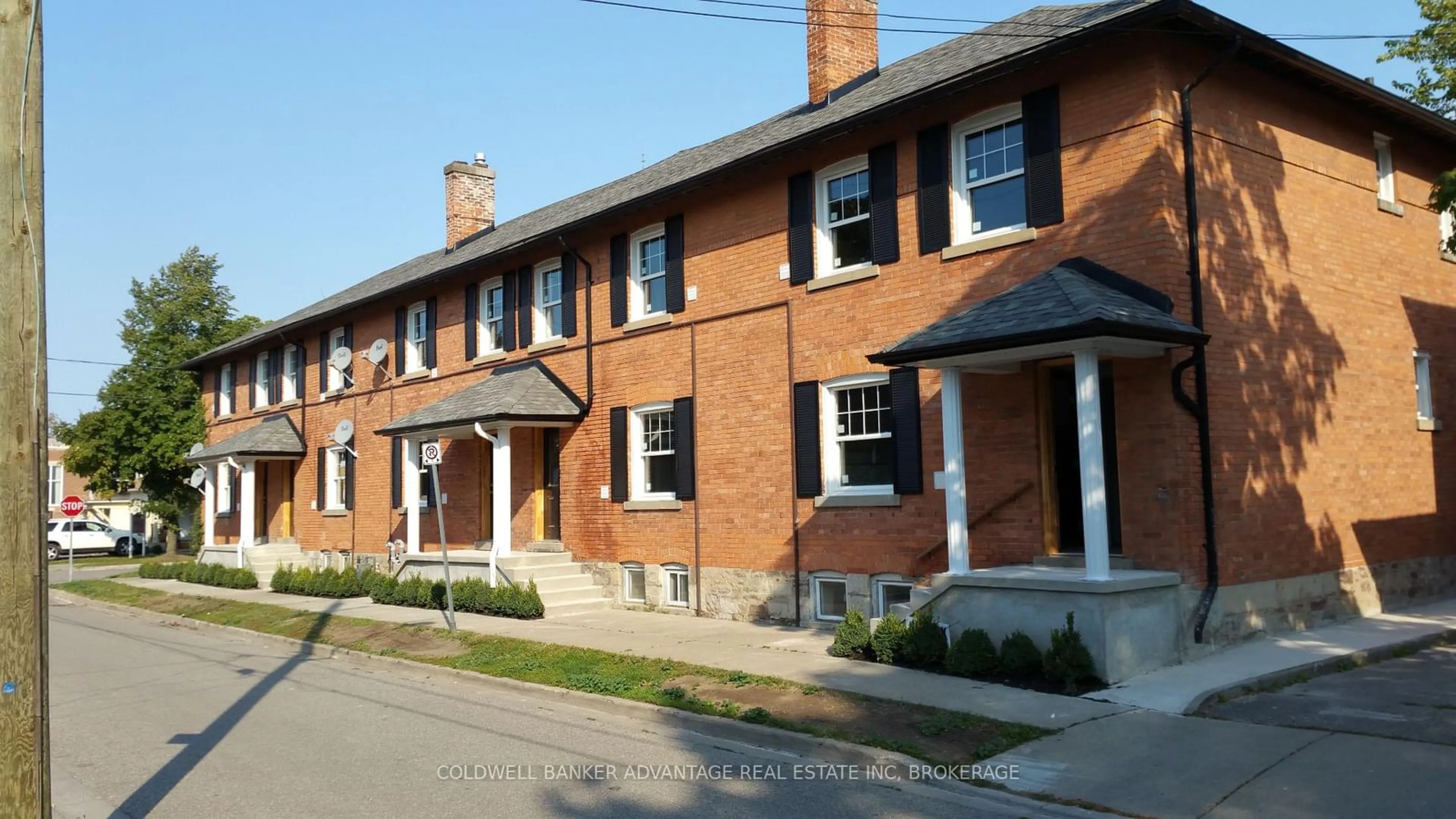 Home with brick exterior material, street for 18 1/2-26 Cherry St, St. Catharines Ontario L2R 5M4