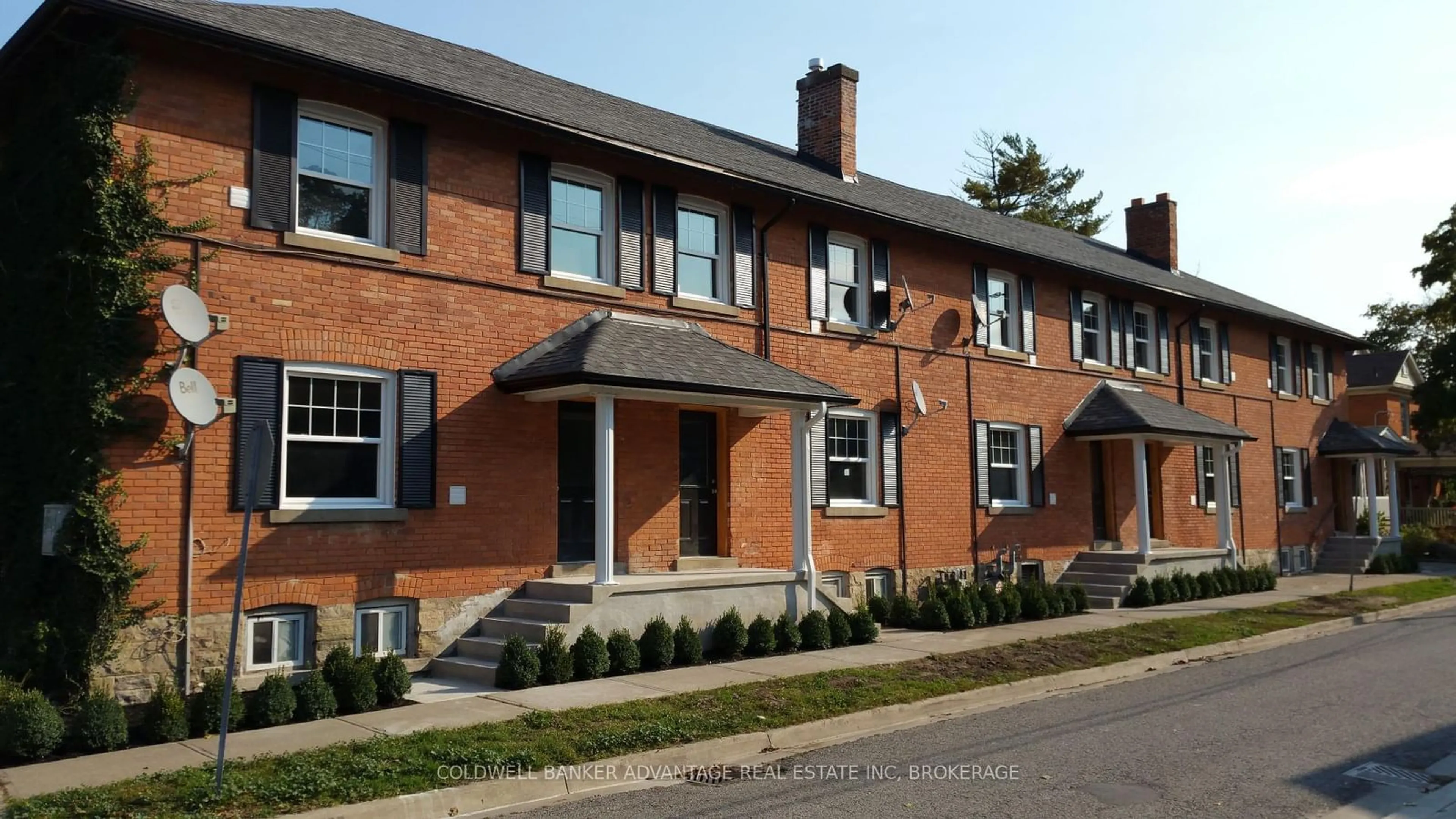 Home with brick exterior material, street for 18 1/2-26 Cherry St, St. Catharines Ontario L2R 5M4