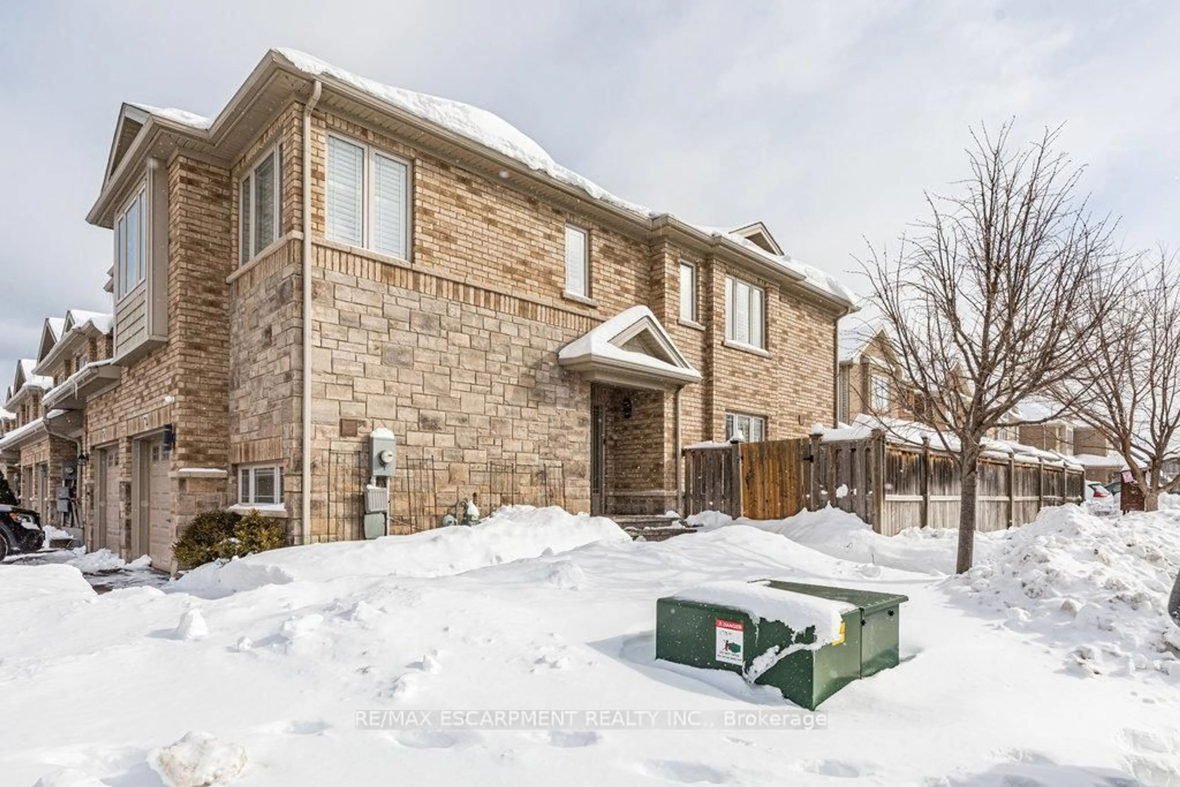 Home with brick exterior material, street for 74 Edenrock Dr, Hamilton Ontario L8E 0G7