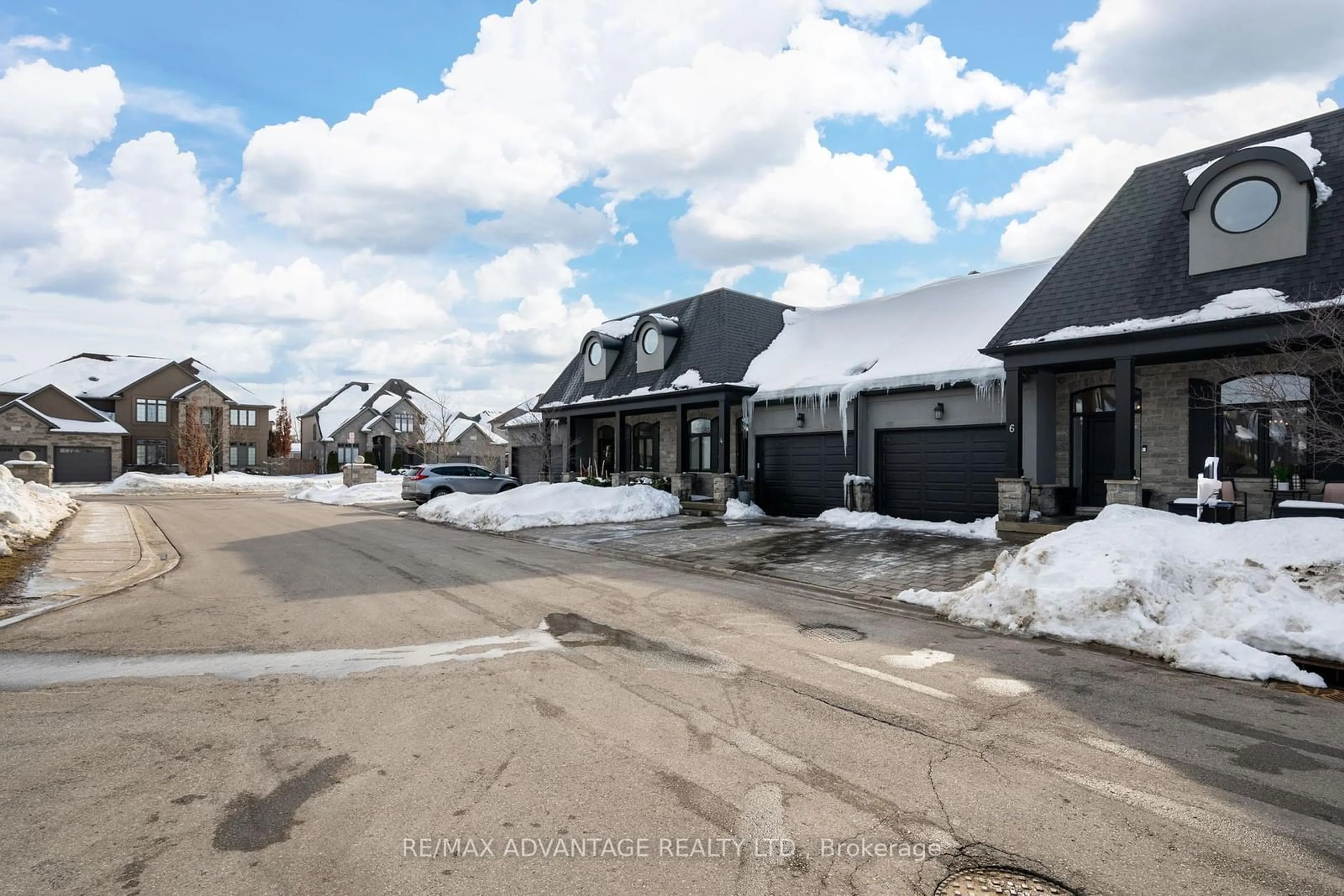 A pic from outside/outdoor area/front of a property/back of a property/a pic from drone, street for 2215 Callingham Dr #6, London Ontario N6G 0P1