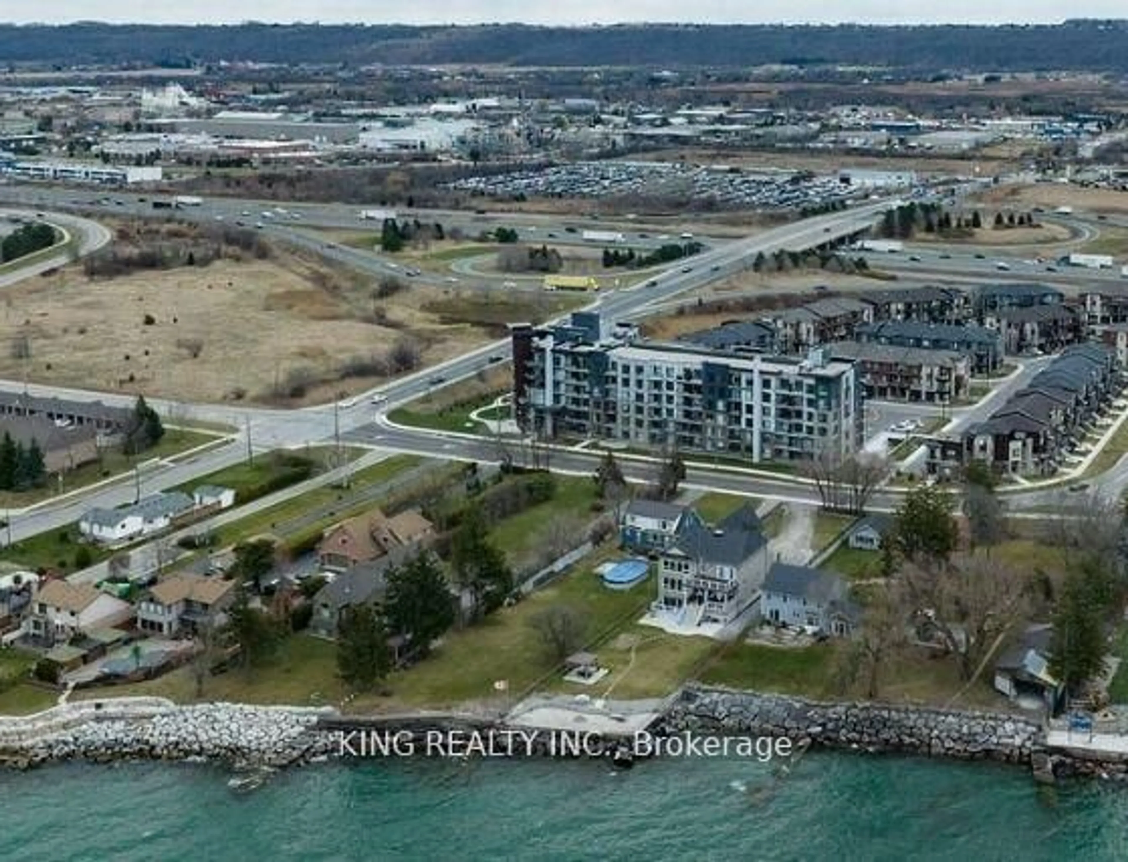 A pic from outside/outdoor area/front of a property/back of a property/a pic from drone, water/lake/river/ocean view for 600 North Service Rd #306, Hamilton Ontario L8E 0L2