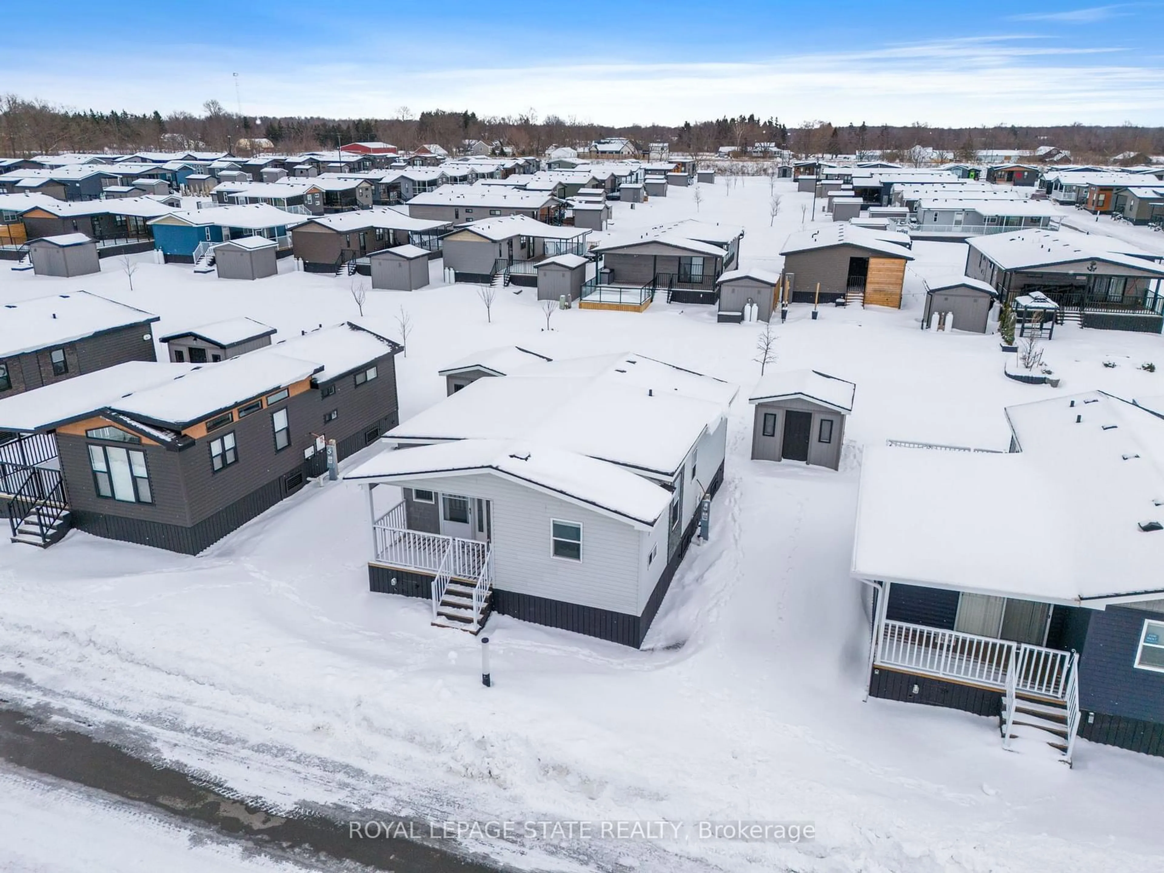 A pic from outside/outdoor area/front of a property/back of a property/a pic from drone, street for 490 Empire Rd #156, Port Colborne Ontario L0S 1R0