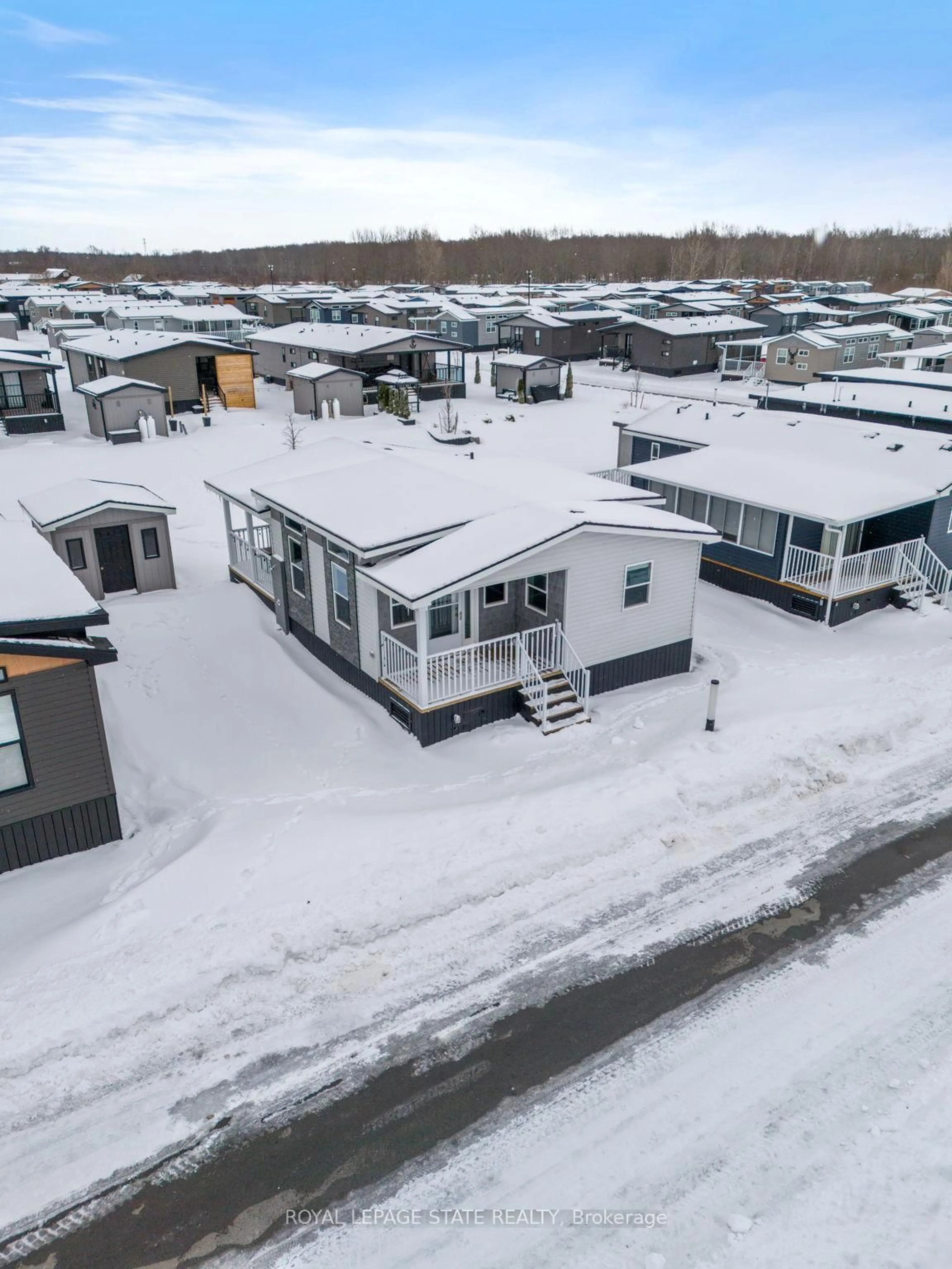 A pic from outside/outdoor area/front of a property/back of a property/a pic from drone, street for 490 Empire Rd #156, Port Colborne Ontario L0S 1R0