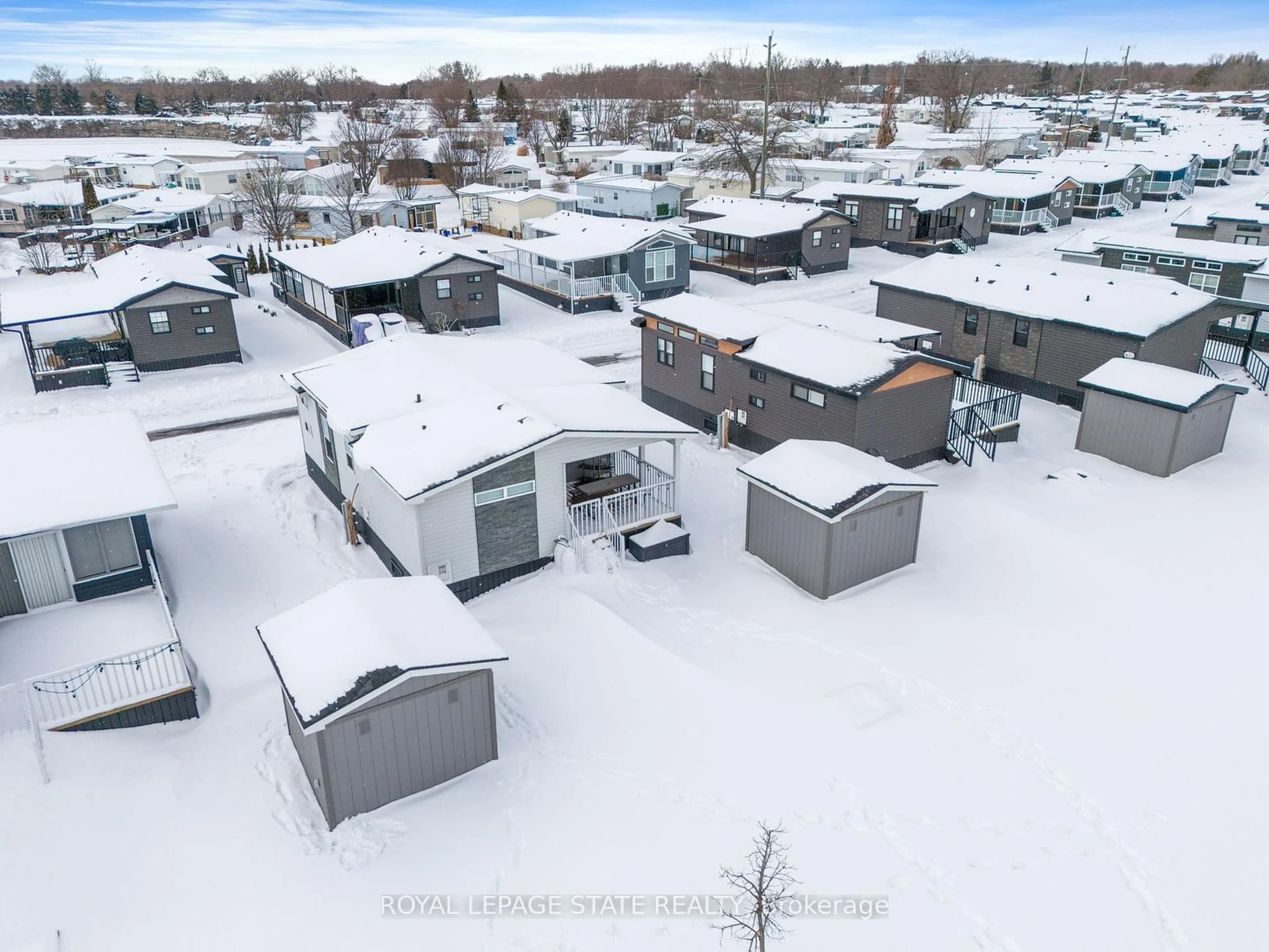 A pic from outside/outdoor area/front of a property/back of a property/a pic from drone, street for 490 Empire Rd #156, Port Colborne Ontario L0S 1R0