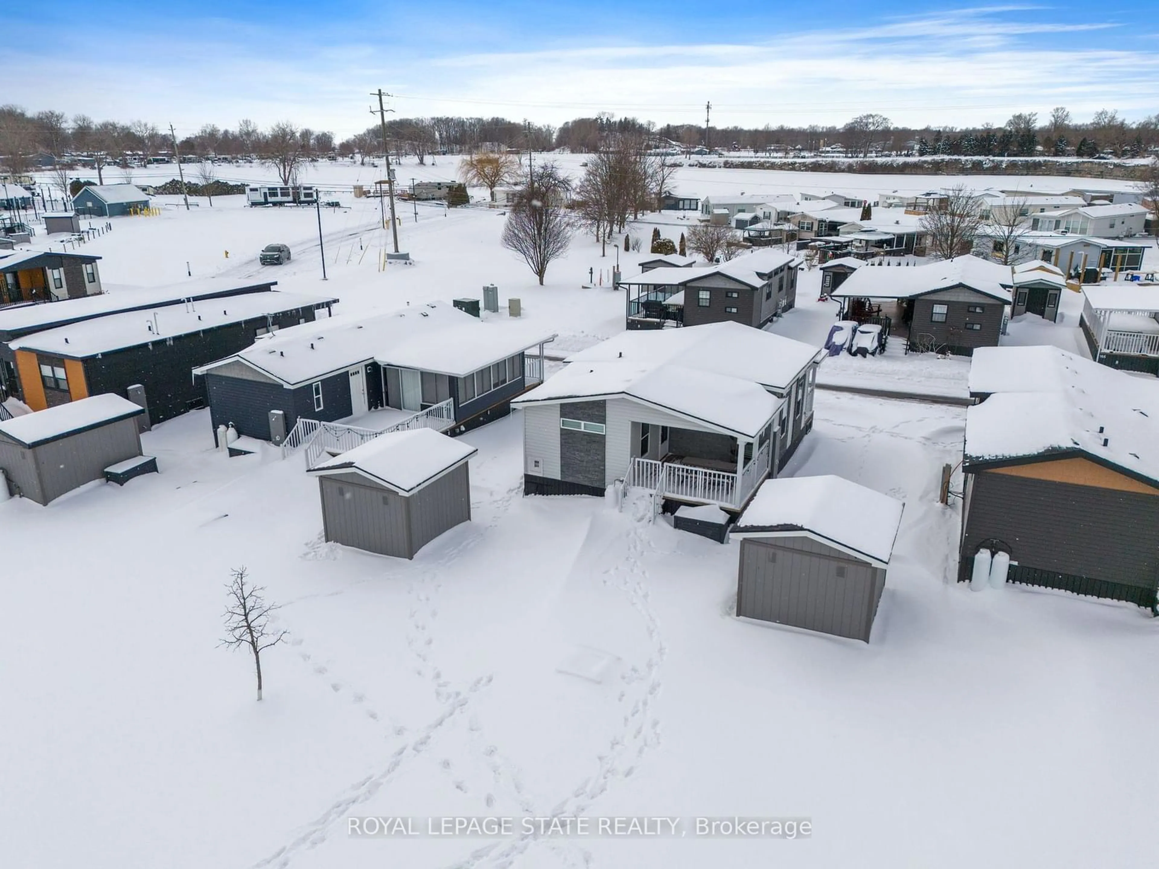 A pic from outside/outdoor area/front of a property/back of a property/a pic from drone, street for 490 Empire Rd #156, Port Colborne Ontario L0S 1R0