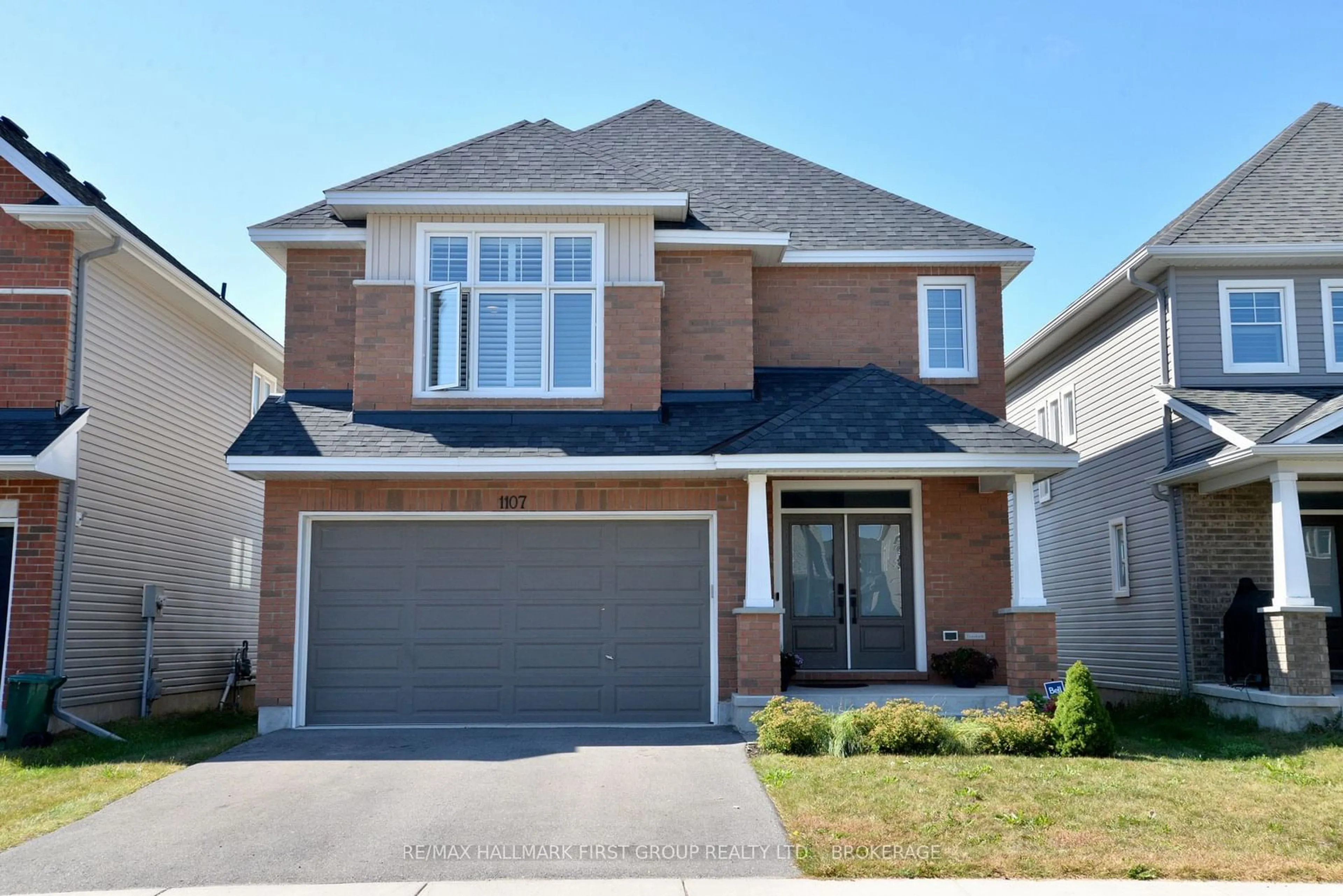 Home with brick exterior material, street for 1107 Woodhaven Dr, Kingston Ontario K7P 0R7