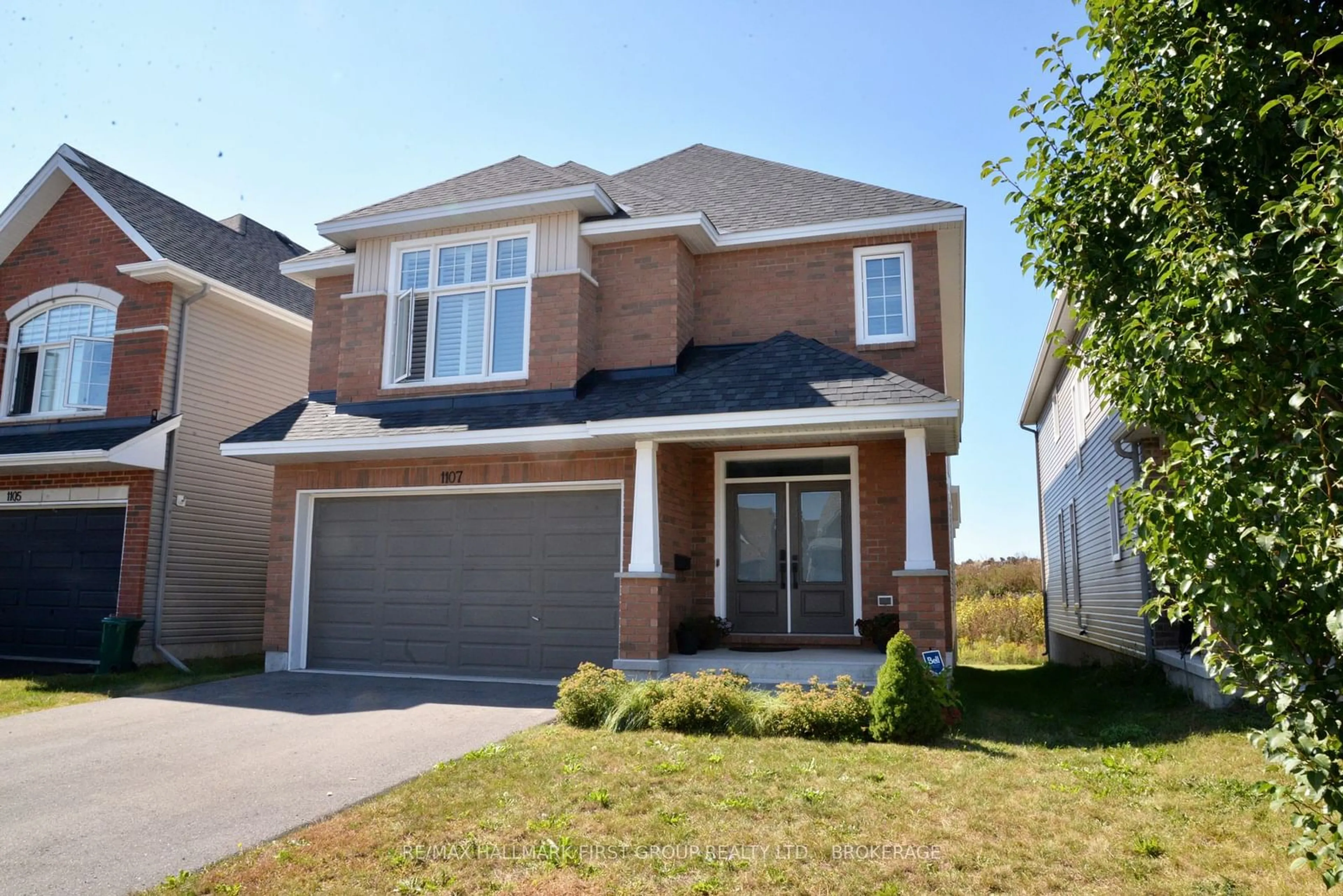 Home with brick exterior material, street for 1107 Woodhaven Dr, Kingston Ontario K7P 0R7