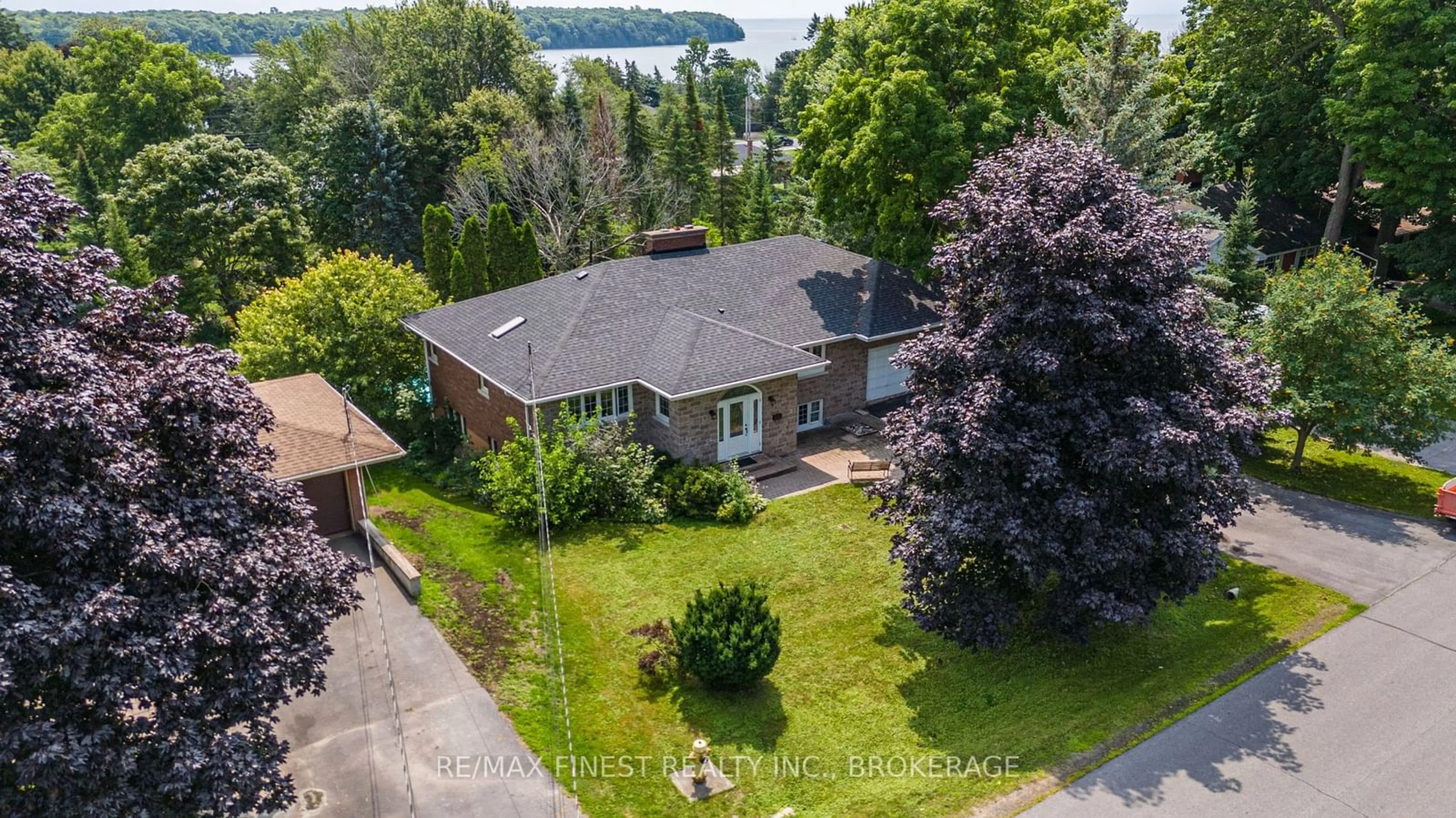 A pic from outside/outdoor area/front of a property/back of a property/a pic from drone, water/lake/river/ocean view for 432 SOUTHWOOD Dr, Kingston Ontario K7M 5P6