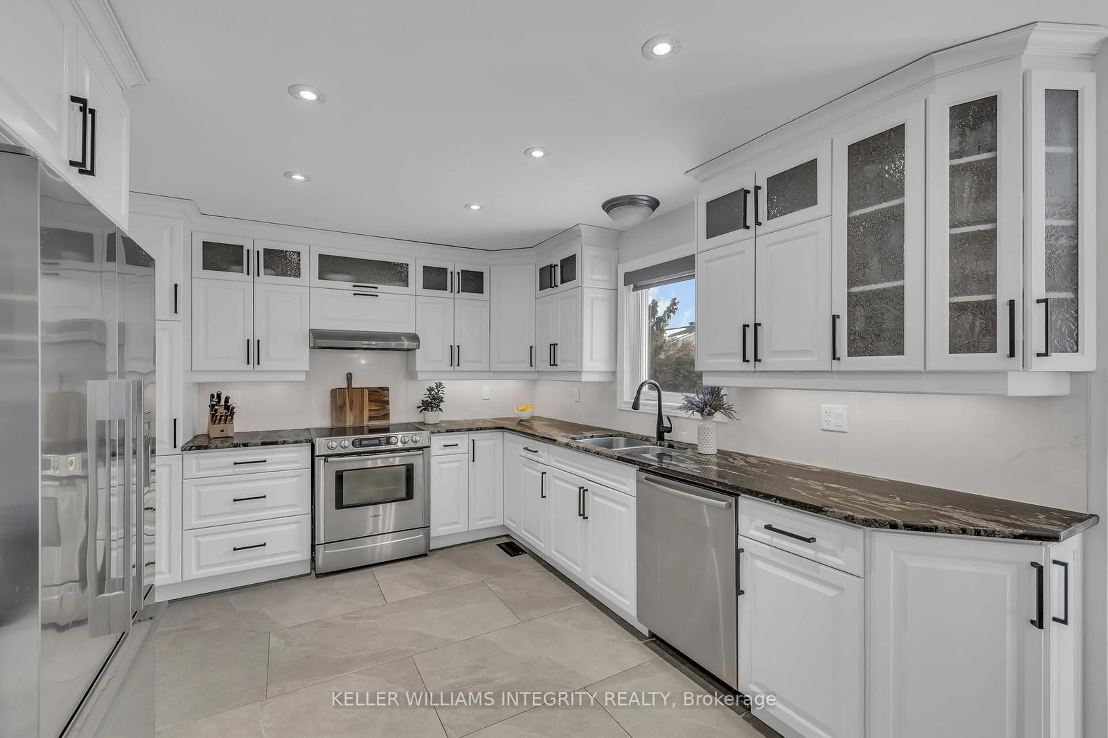 Open concept kitchen, ceramic/tile floor for 61 Shearer Cres, Kanata Ontario K2L 3N3