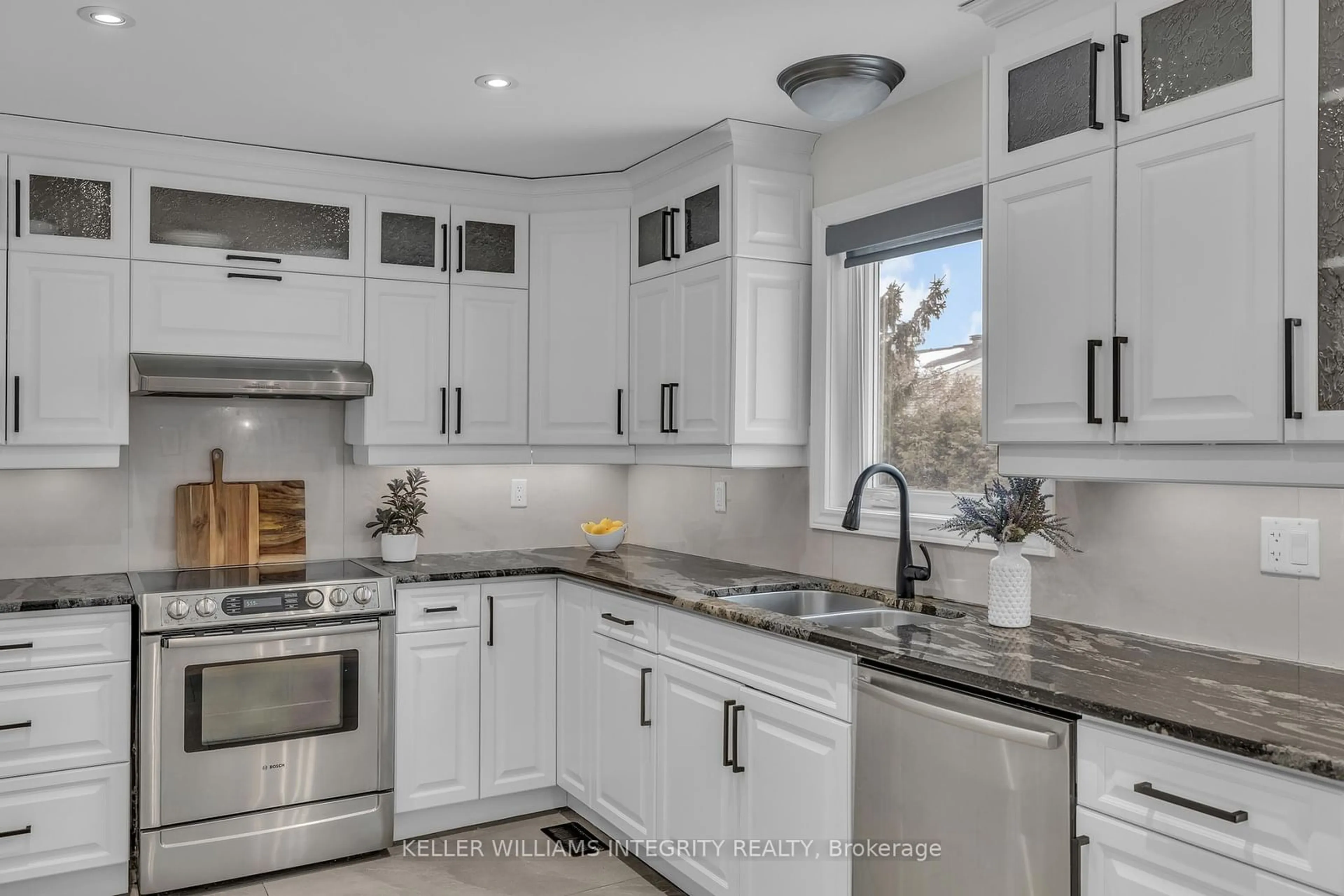 Open concept kitchen, ceramic/tile floor for 61 Shearer Cres, Kanata Ontario K2L 3N3