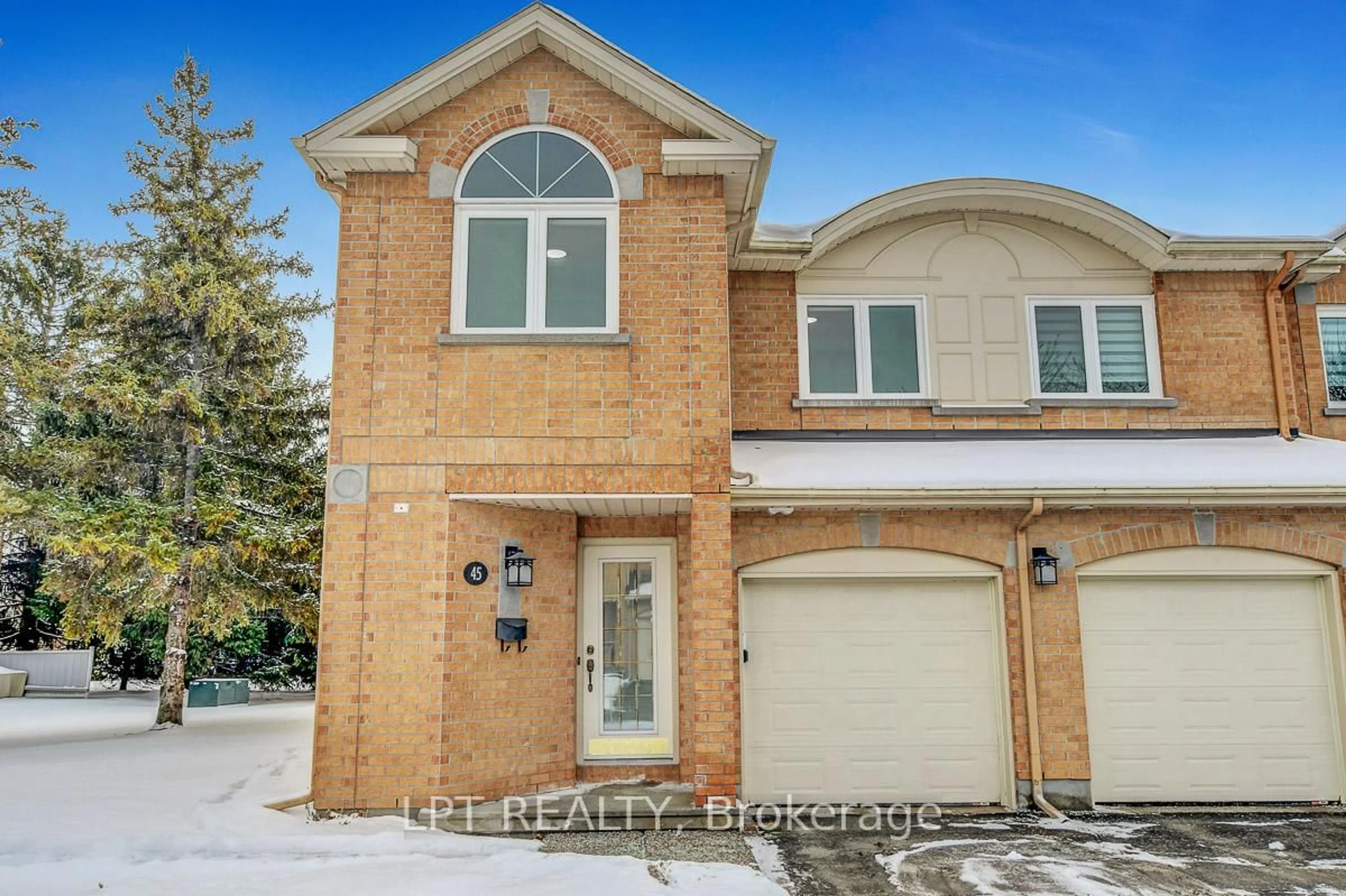 Home with brick exterior material, street for 45 Grandcourt Dr, Ottawa Ontario K2G 5W9