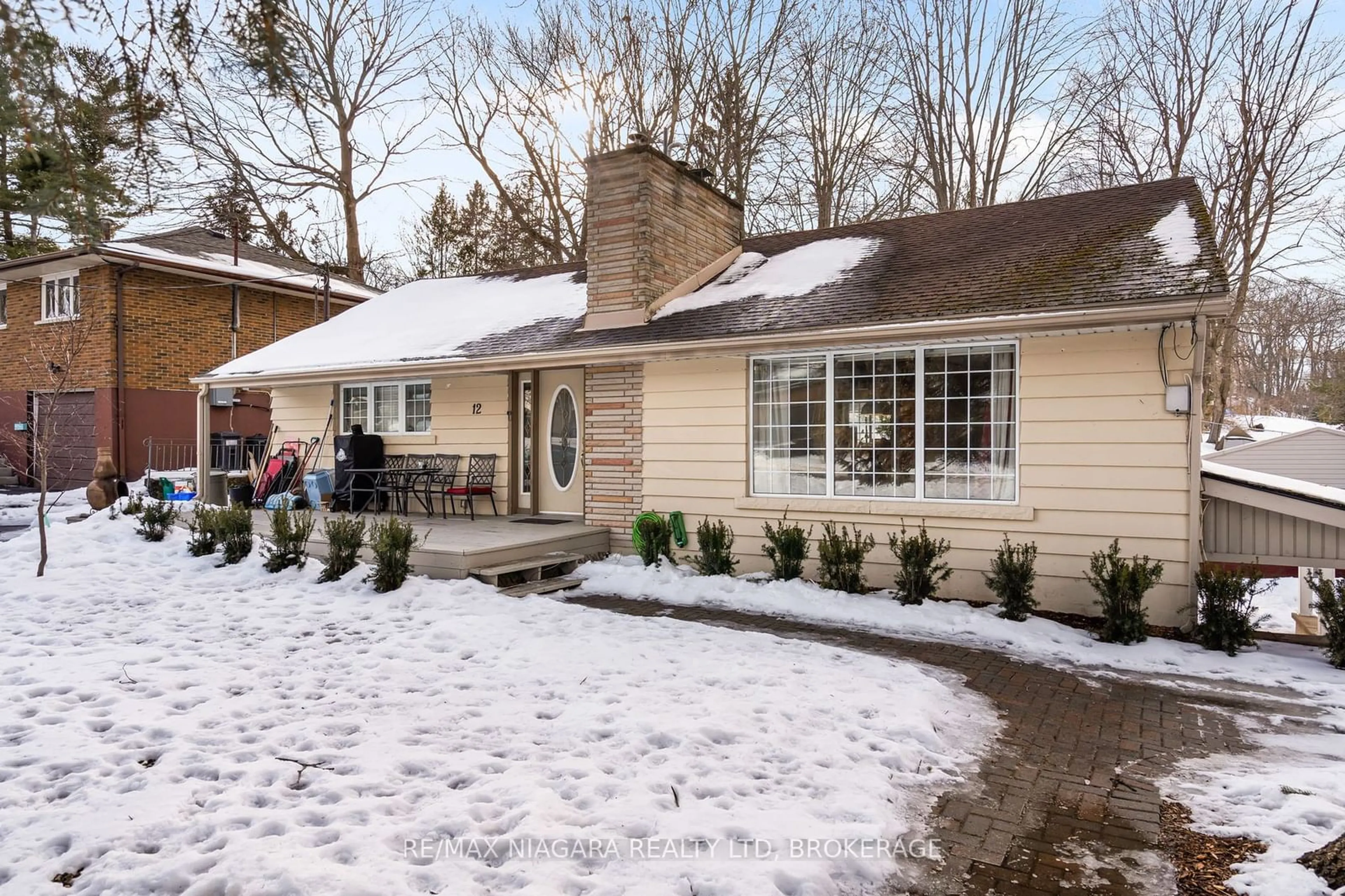 Home with vinyl exterior material, street for 12 Cedar St, Port Colborne Ontario L3K 2T9