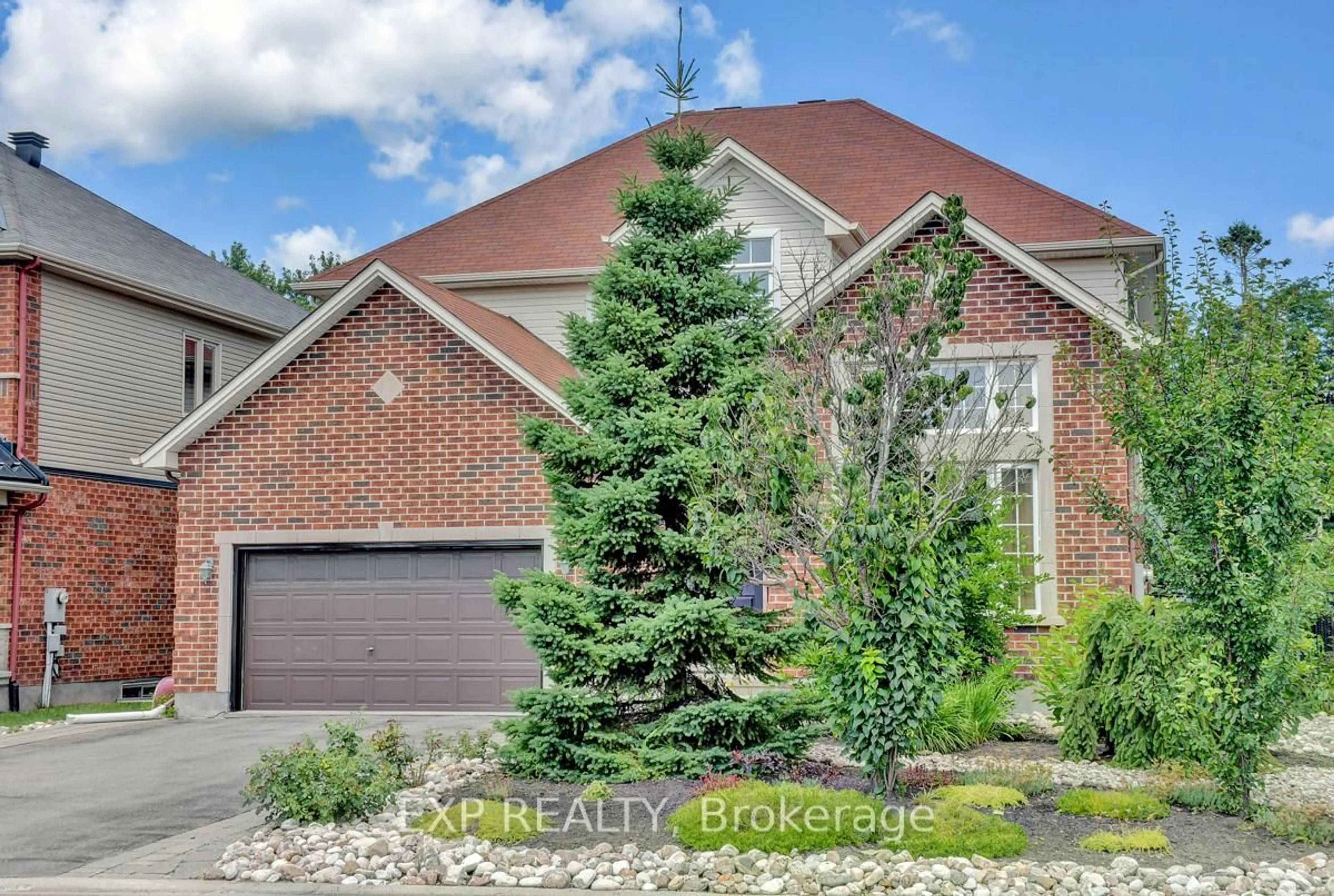 Home with brick exterior material, street for 135 RIVERSEDGE Cres, Blossom Park - Airport and Area Ontario K1V 0Z8