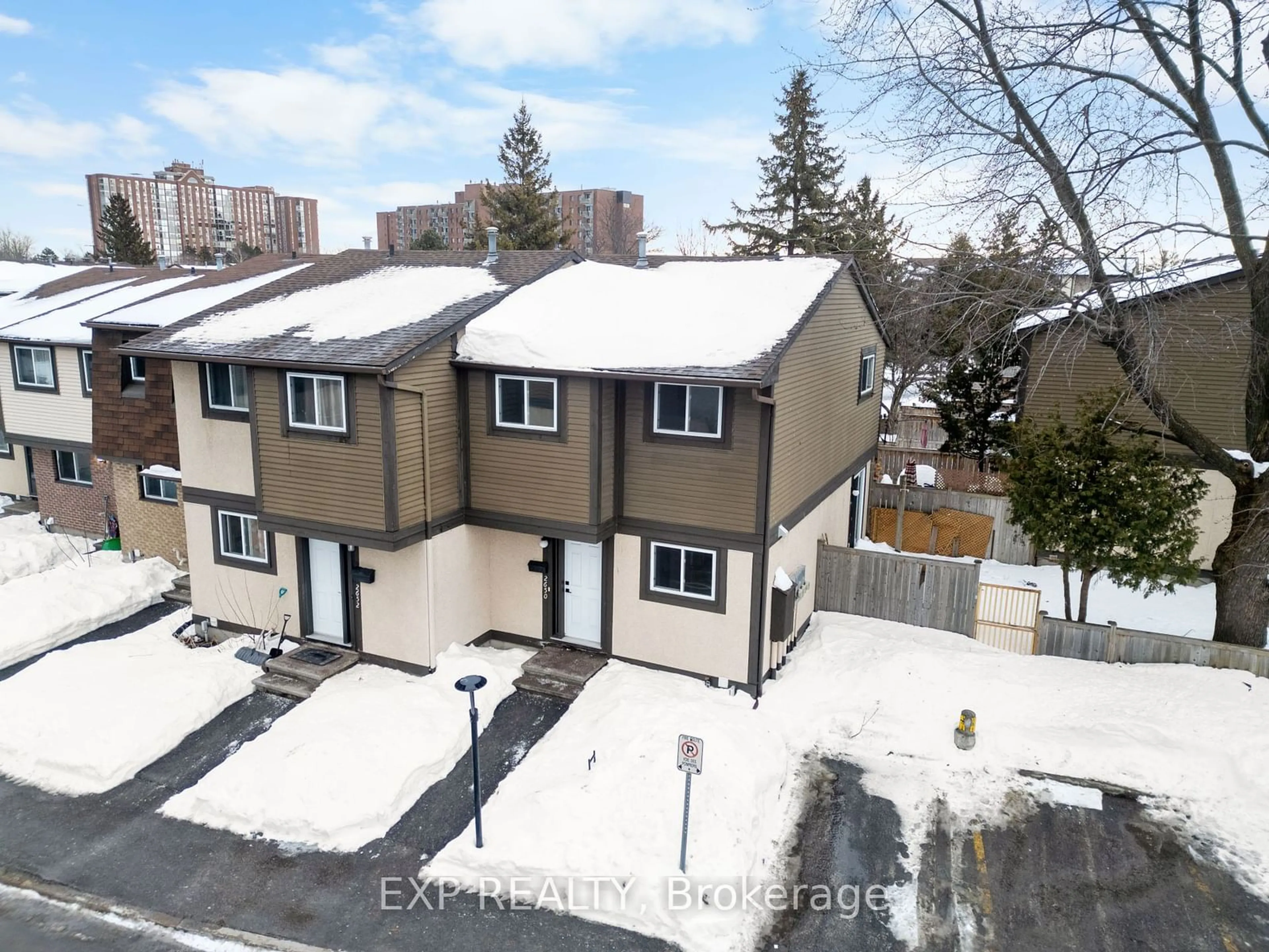 A pic from outside/outdoor area/front of a property/back of a property/a pic from drone, street for 2650 Pimlico Cres #107, Blossom Park - Airport and Area Ontario K1T 2A8