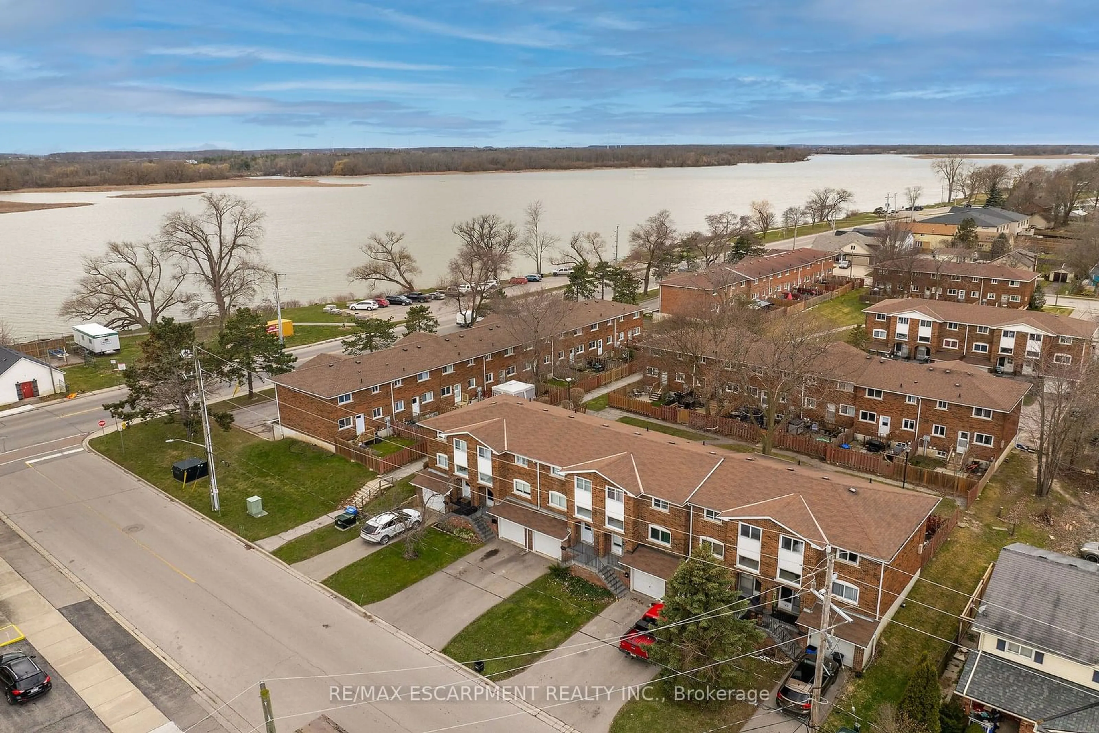 A pic from outside/outdoor area/front of a property/back of a property/a pic from drone, water/lake/river/ocean view for 114 CEDAR St #42, Haldimand Ontario N1A 3C7