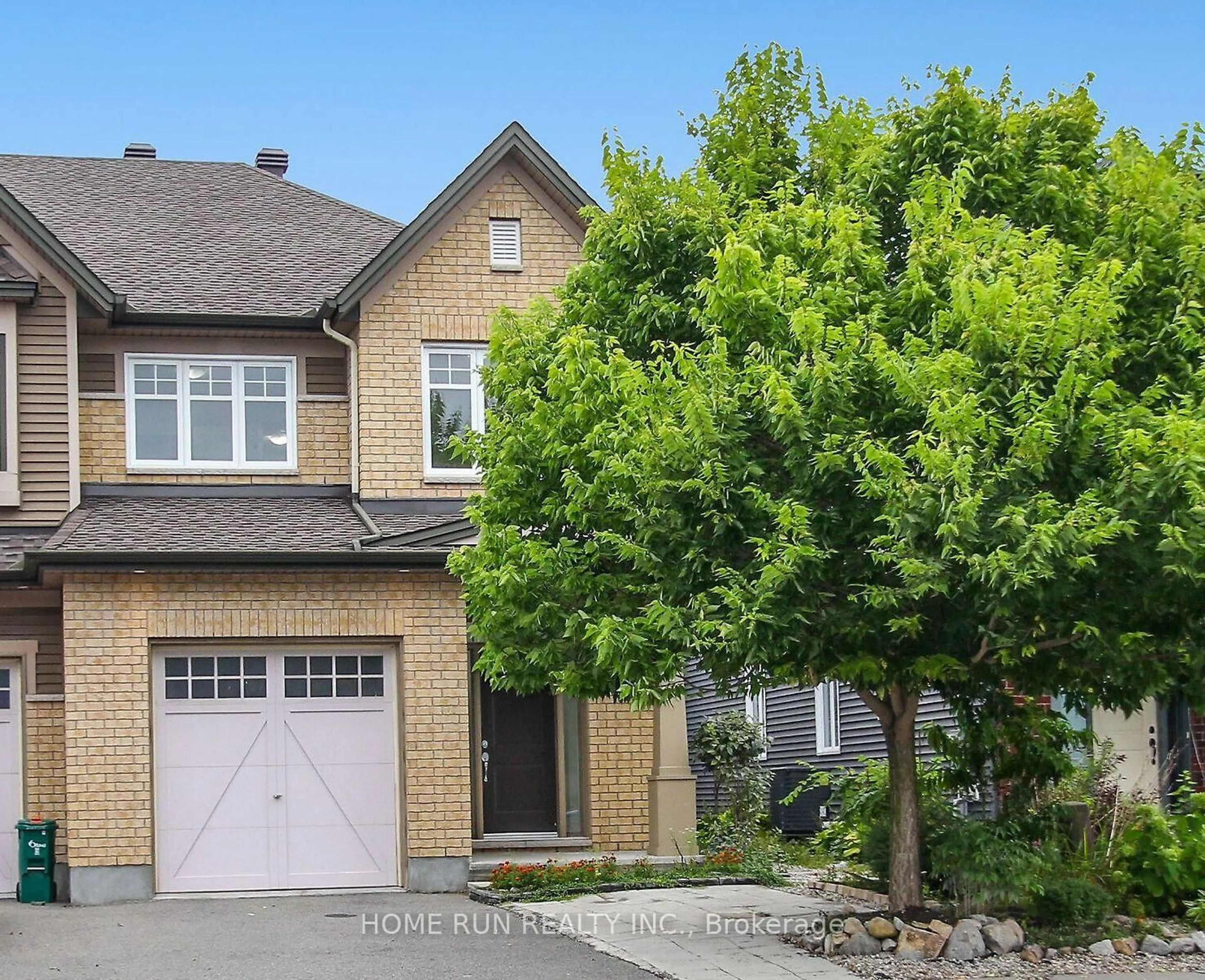 Home with brick exterior material, street for 123 HIGHBURY PARK Dr, Barrhaven Ontario K2J 5Y1