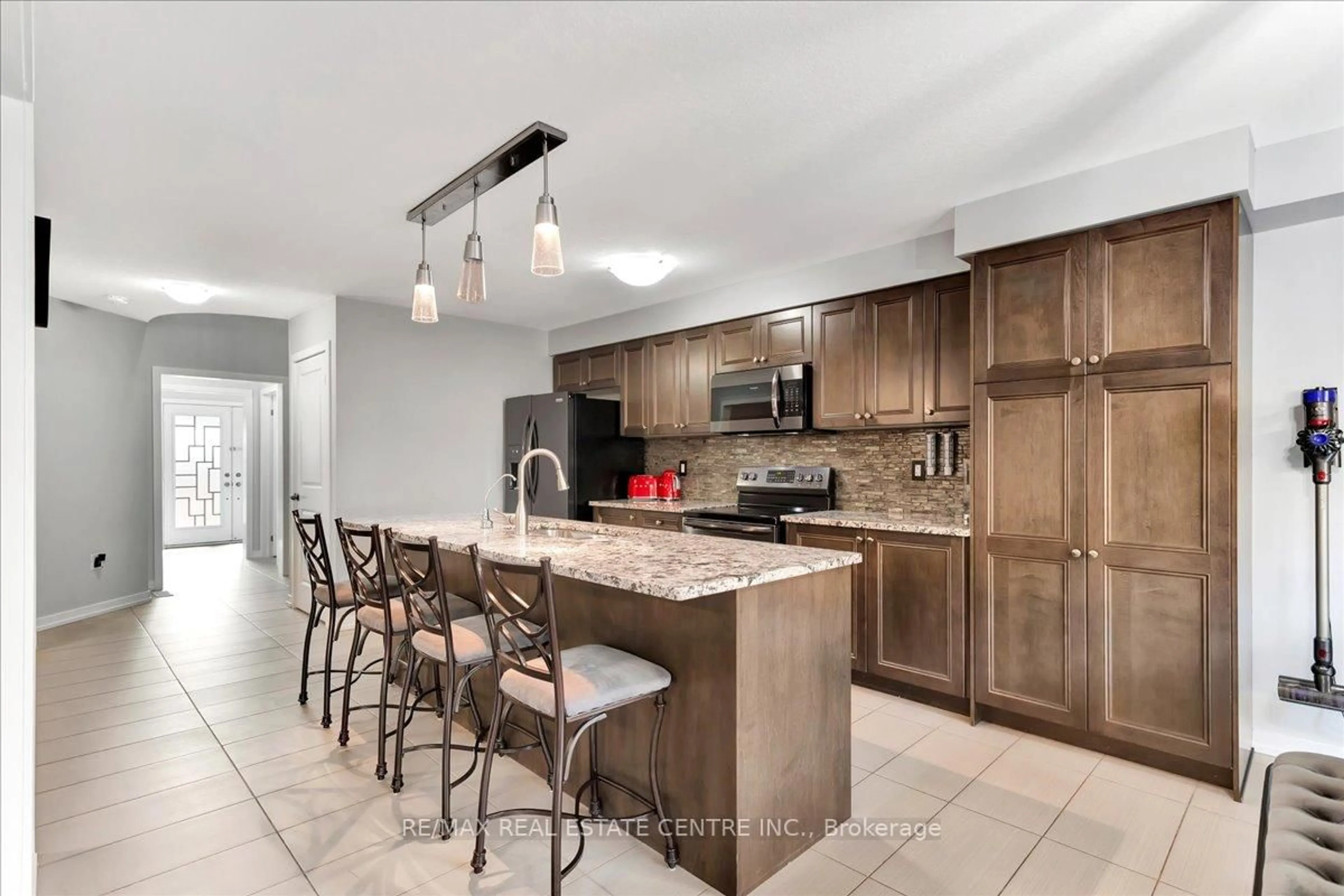 Open concept kitchen, ceramic/tile floor for 30 Scarletwood St, Hamilton Ontario L8J 0K8