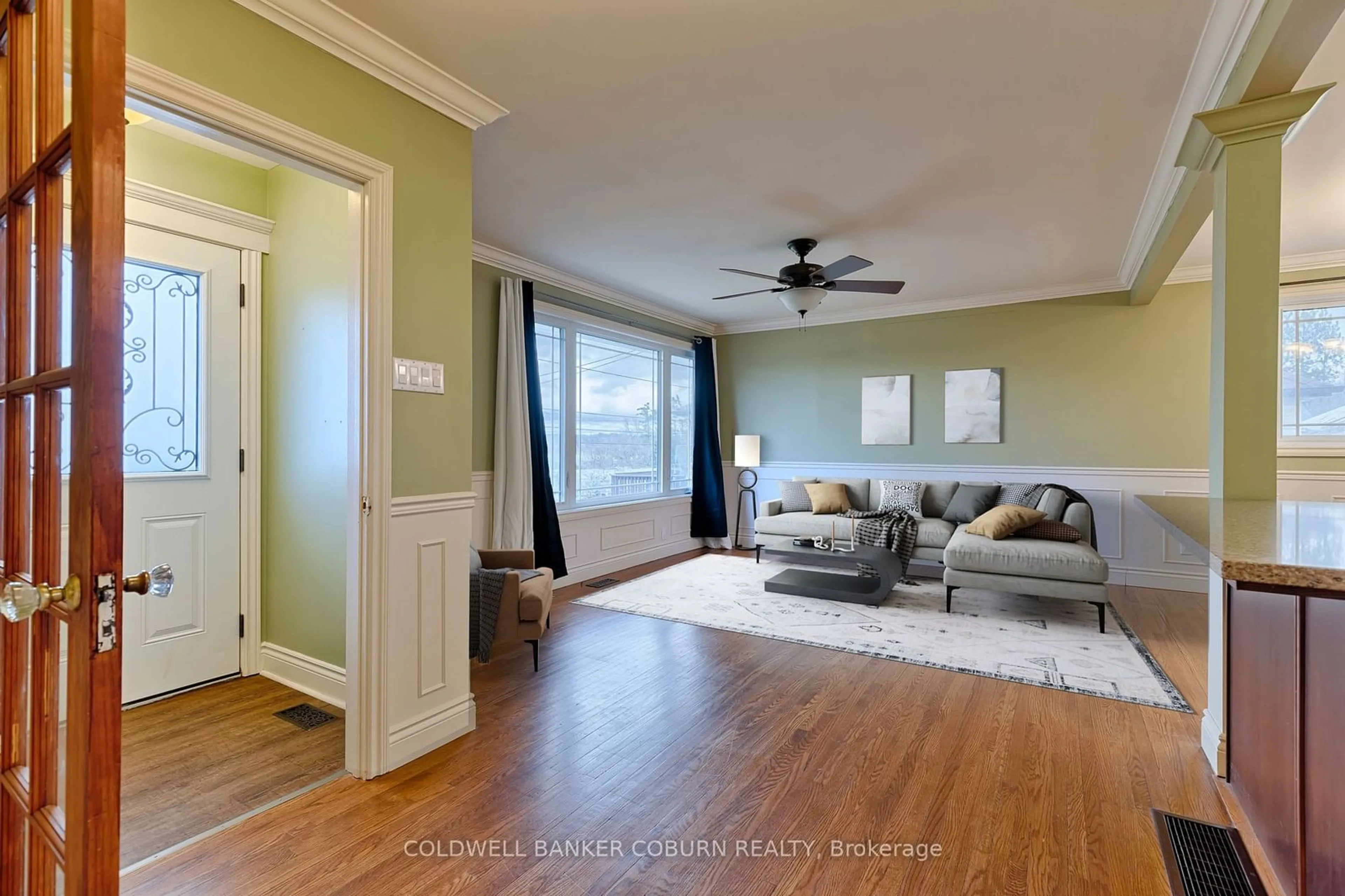 Living room with furniture, wood/laminate floor for 53 Pembroke St, Whitewater Region Ontario K0J 1K0