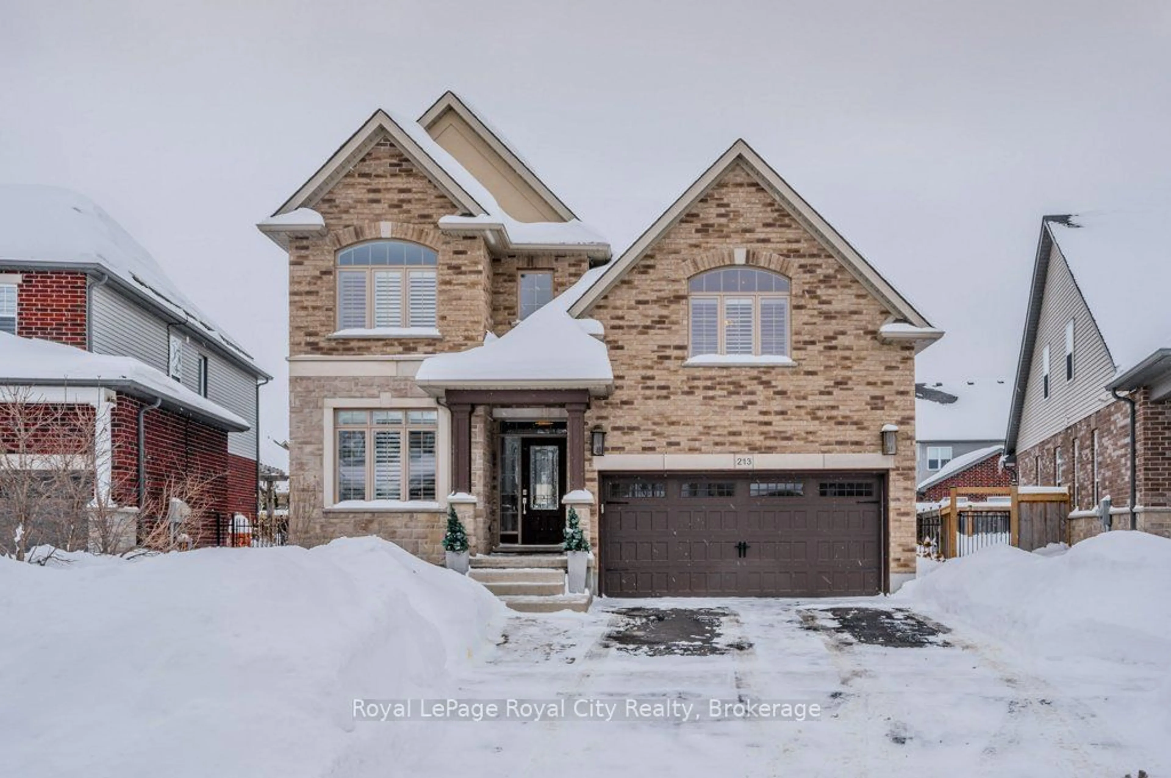 Home with brick exterior material, street for 213 Tremaine Cres, Kitchener Ontario N2A 4L9