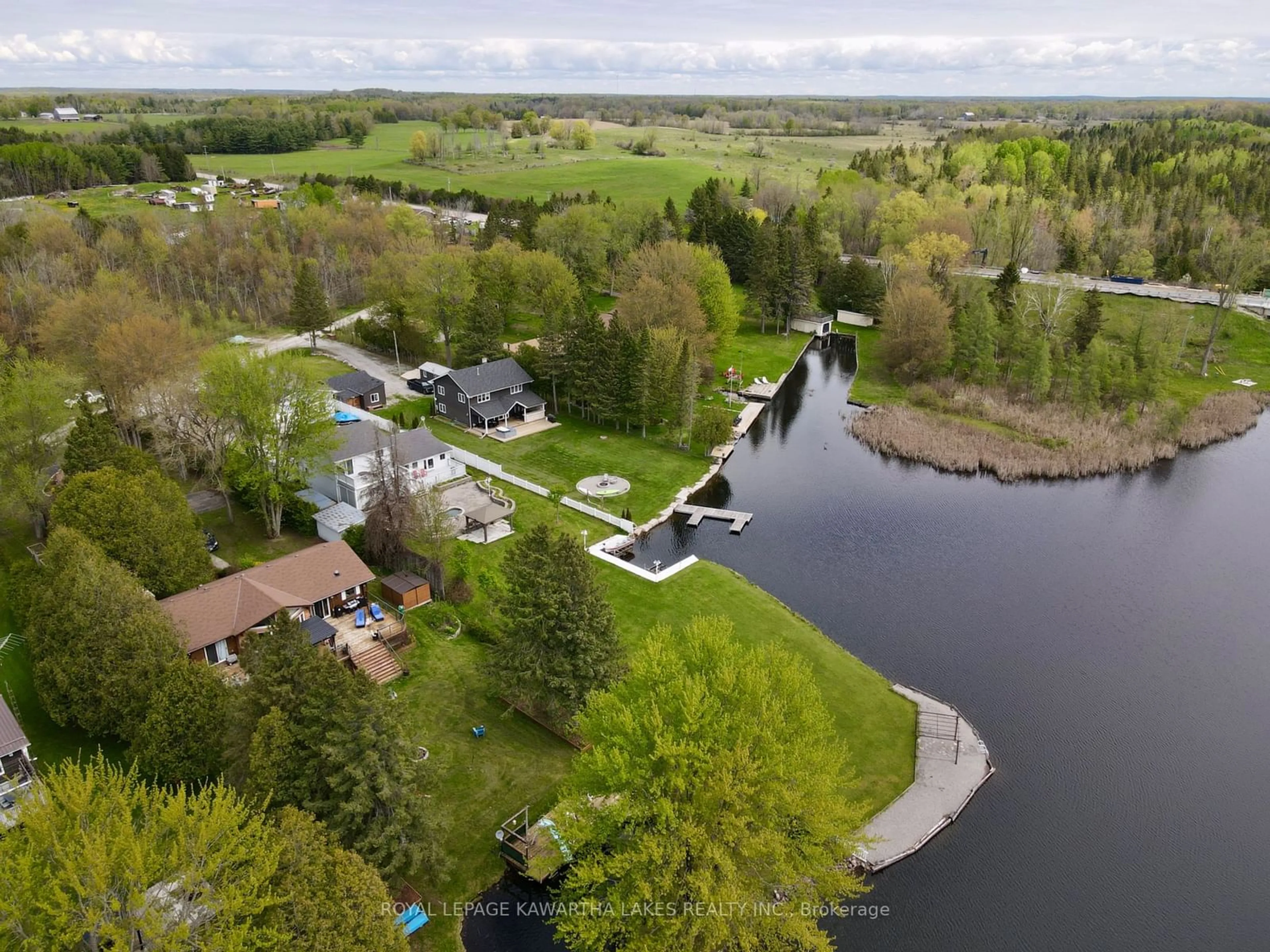 A pic from outside/outdoor area/front of a property/back of a property/a pic from drone, water/lake/river/ocean view for 21 Trent View Rd, Kawartha Lakes Ontario K0M 2B0