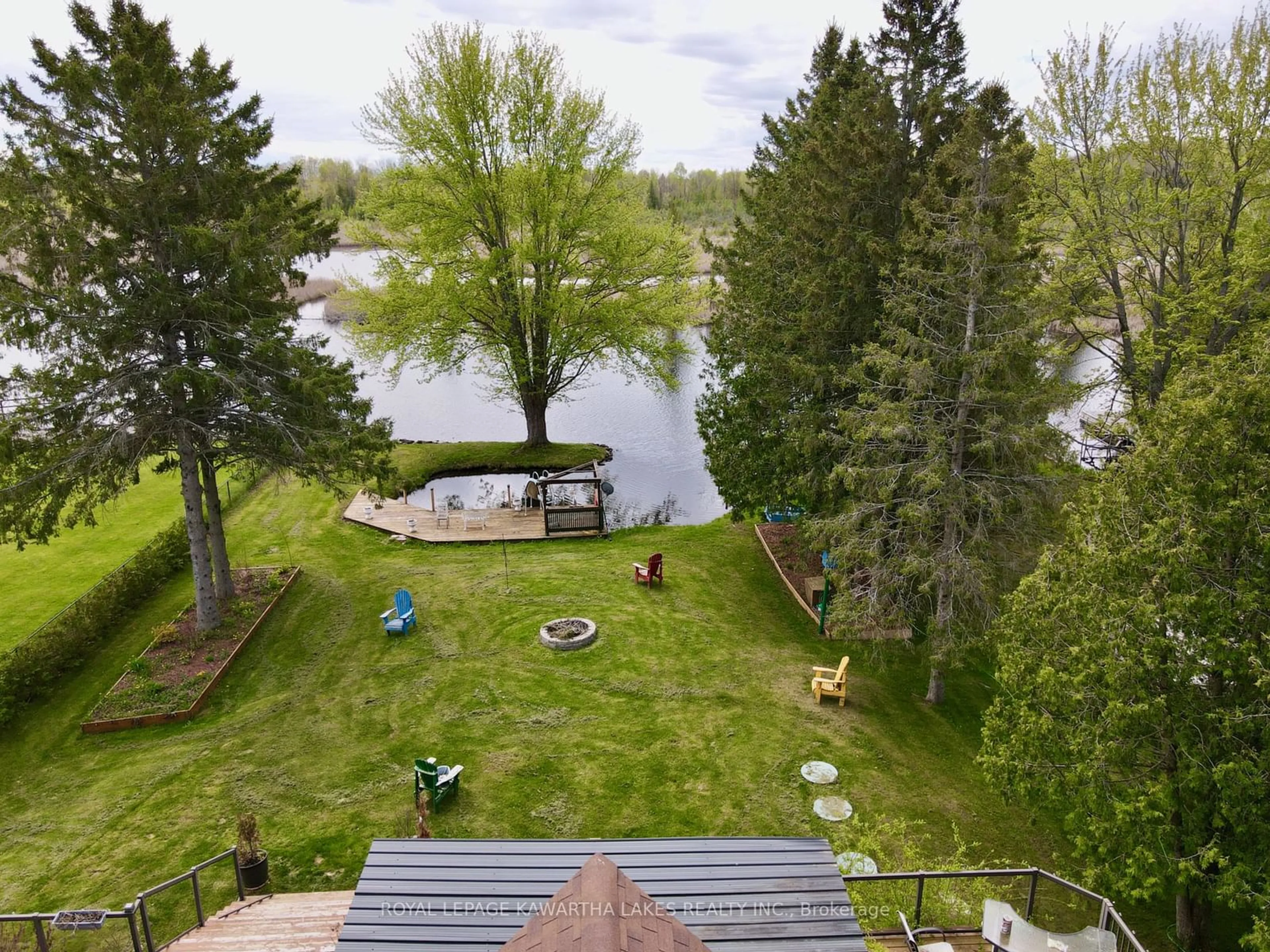 A pic from outside/outdoor area/front of a property/back of a property/a pic from drone, water/lake/river/ocean view for 21 Trent View Rd, Kawartha Lakes Ontario K0M 2B0