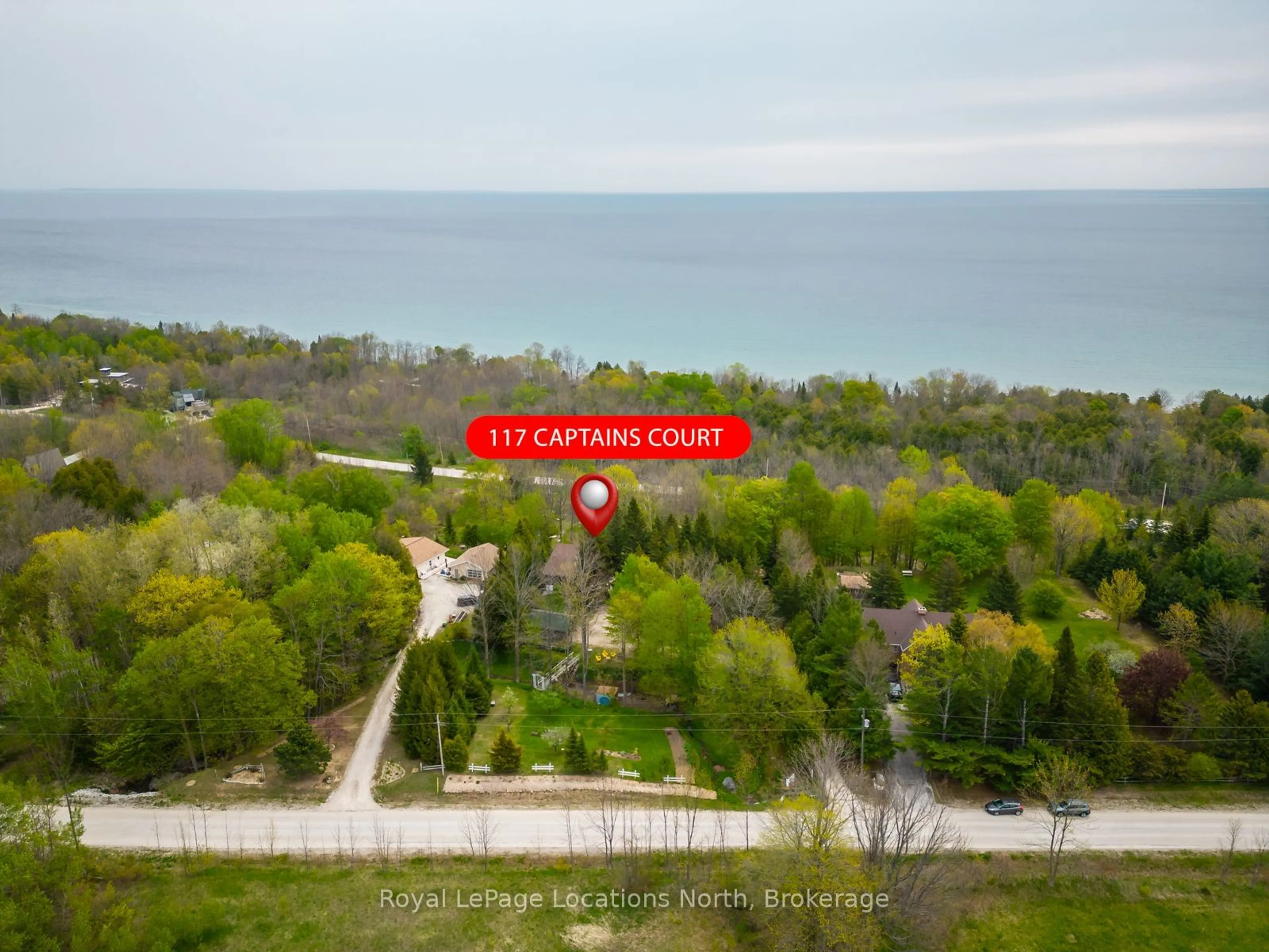 A pic from outside/outdoor area/front of a property/back of a property/a pic from drone, water/lake/river/ocean view for 117 Captain's Crt, Meaford Ontario N4L 1W5