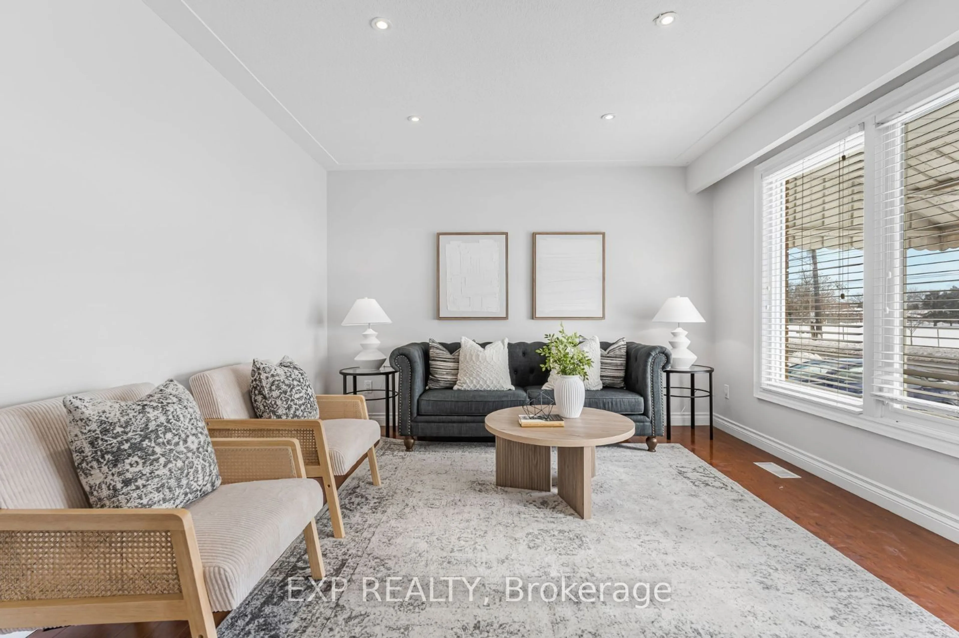 Living room with furniture, wood/laminate floor for 63 Nash Rd, Hamilton Ontario L8H 2P5